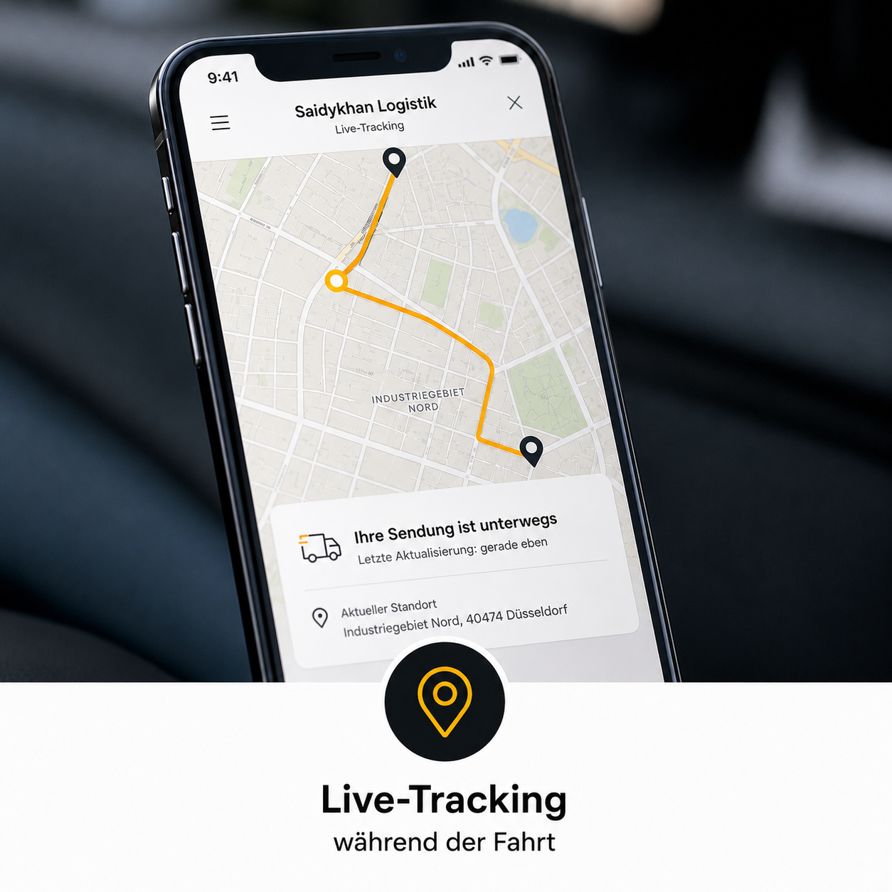 Smartphone mit einer Live-Tracking-App, die eine Route auf einer Karte durch das Industriegebiet Nord in Düsseldorf zeigt, mit Statusanzeige und aktuellem Standort.