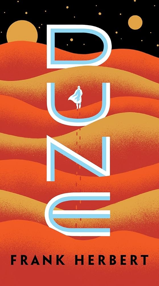 Book cover titled "Dune" by Frank Herbert, featuring an illustration of a desert landscape with wavy sand dunes, a small figure in a flowing cloak, and celestial bodies in the sky.