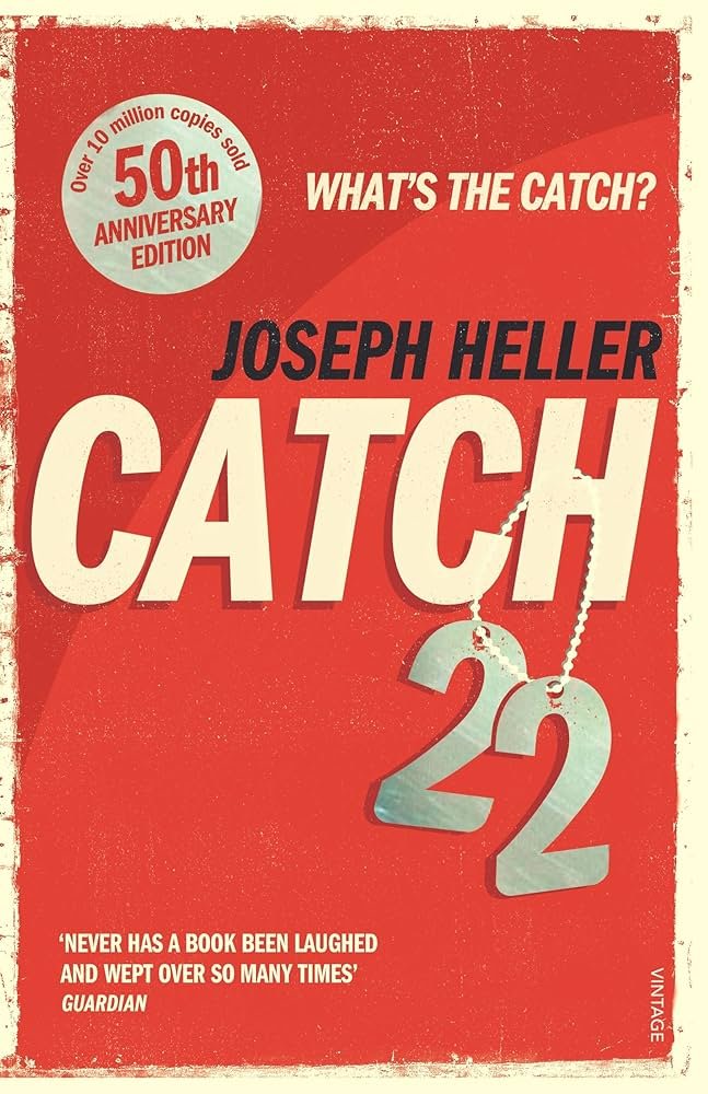 Book cover for 'Catch 22' by Joseph Heller, 50th Anniversary Edition, with a red background, large white and red title, and a silver dog tag with the number 22 hanging from a chain.
