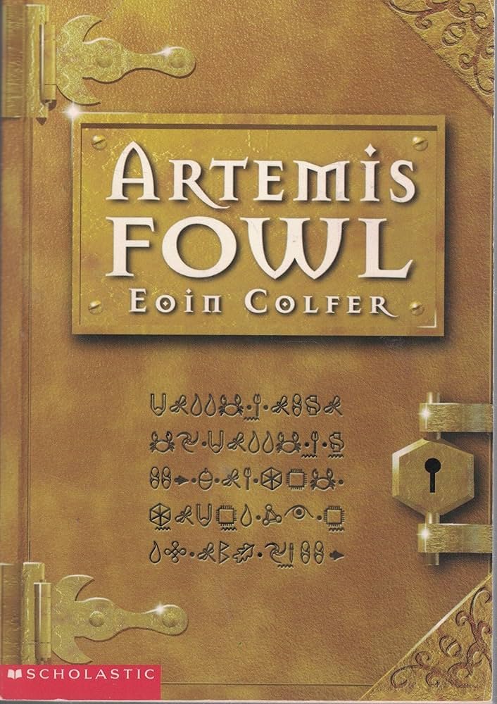 Cover of a book titled 'Artemis Fowl' by Eoin Colfer, published by Scholastic, with gold and brown decorative design and symbols.