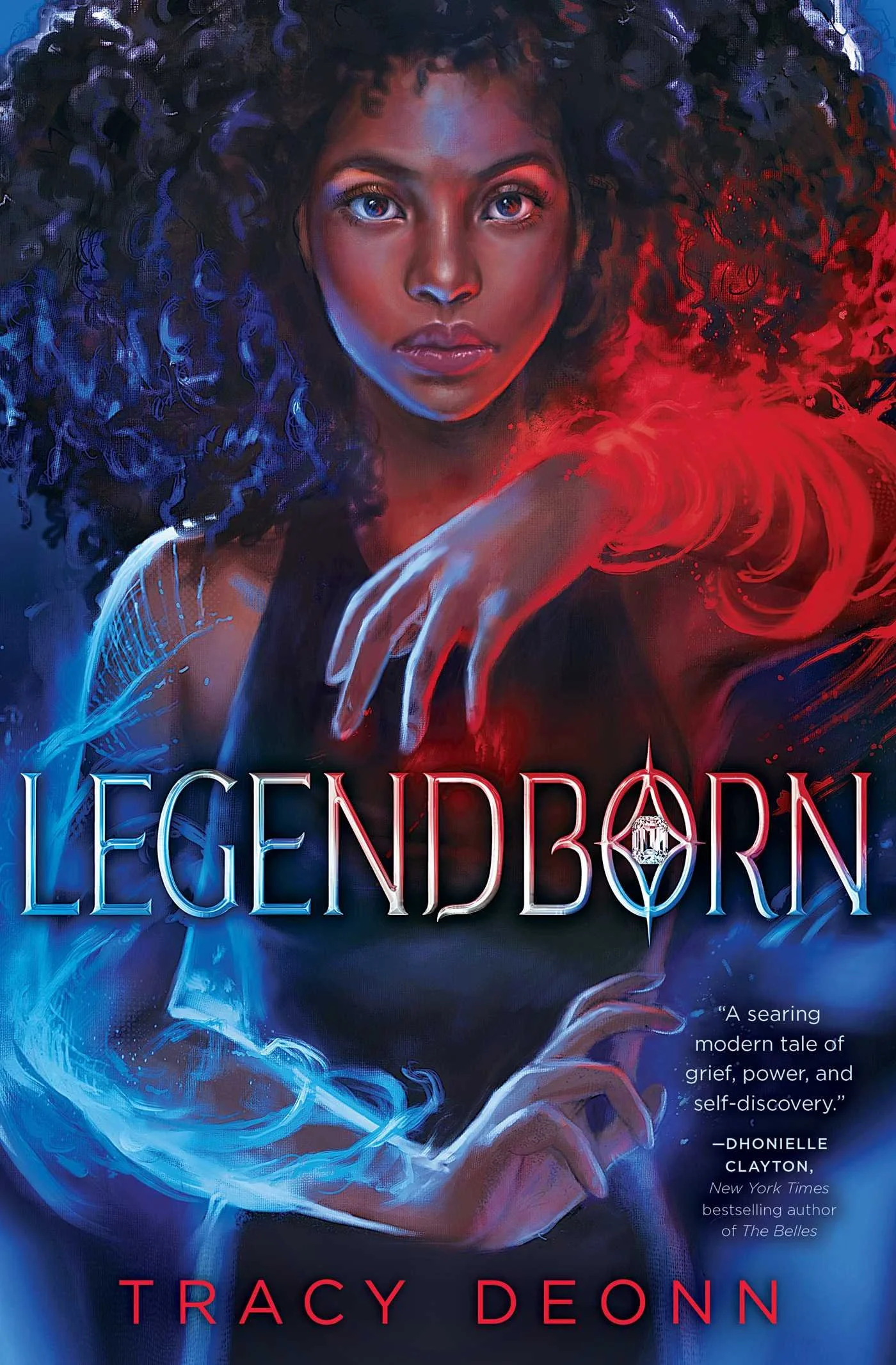 Book cover for 'Legendborn' shows a portrait of a woman with dark curly hair, glowing blue eyes, and dark skin. She is reaching forward with her right hand, which is wrapped in glowing red energy. The background is dark with blue and red swirling energy, and the title 'LEGENDBORN' is prominently displayed in large, stylized font. The author's name, 'Tracy Deonn,' is at the bottom.