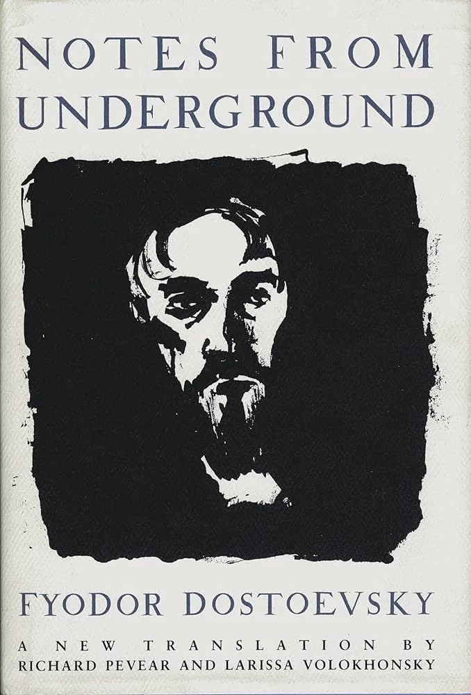 Book cover of "Notes from Underground" by Fyodor Dostoevsky with a black and white illustration of a man's face.