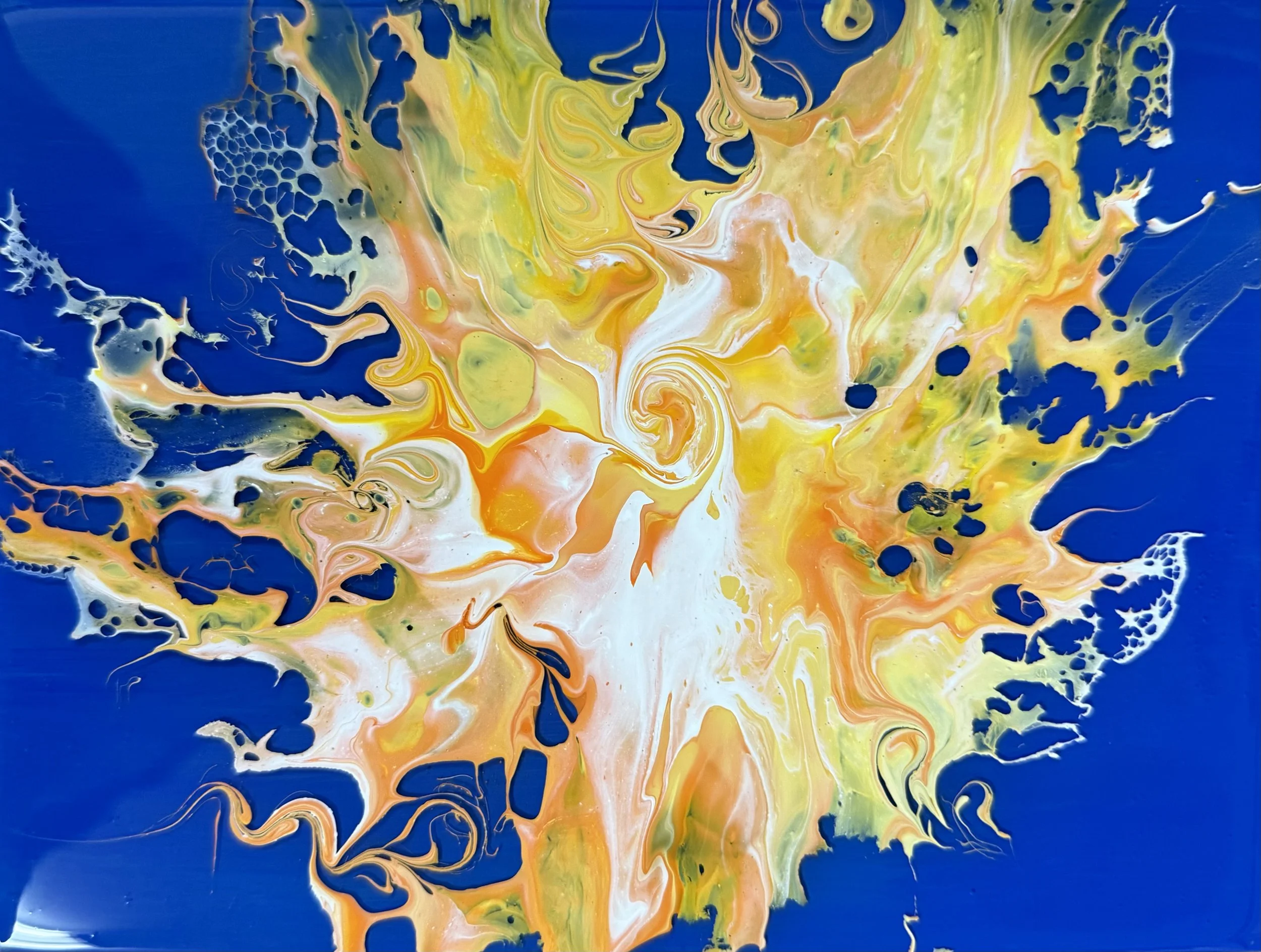 Abstract painting with bright yellow, orange, white, and green swirls on a deep blue background.