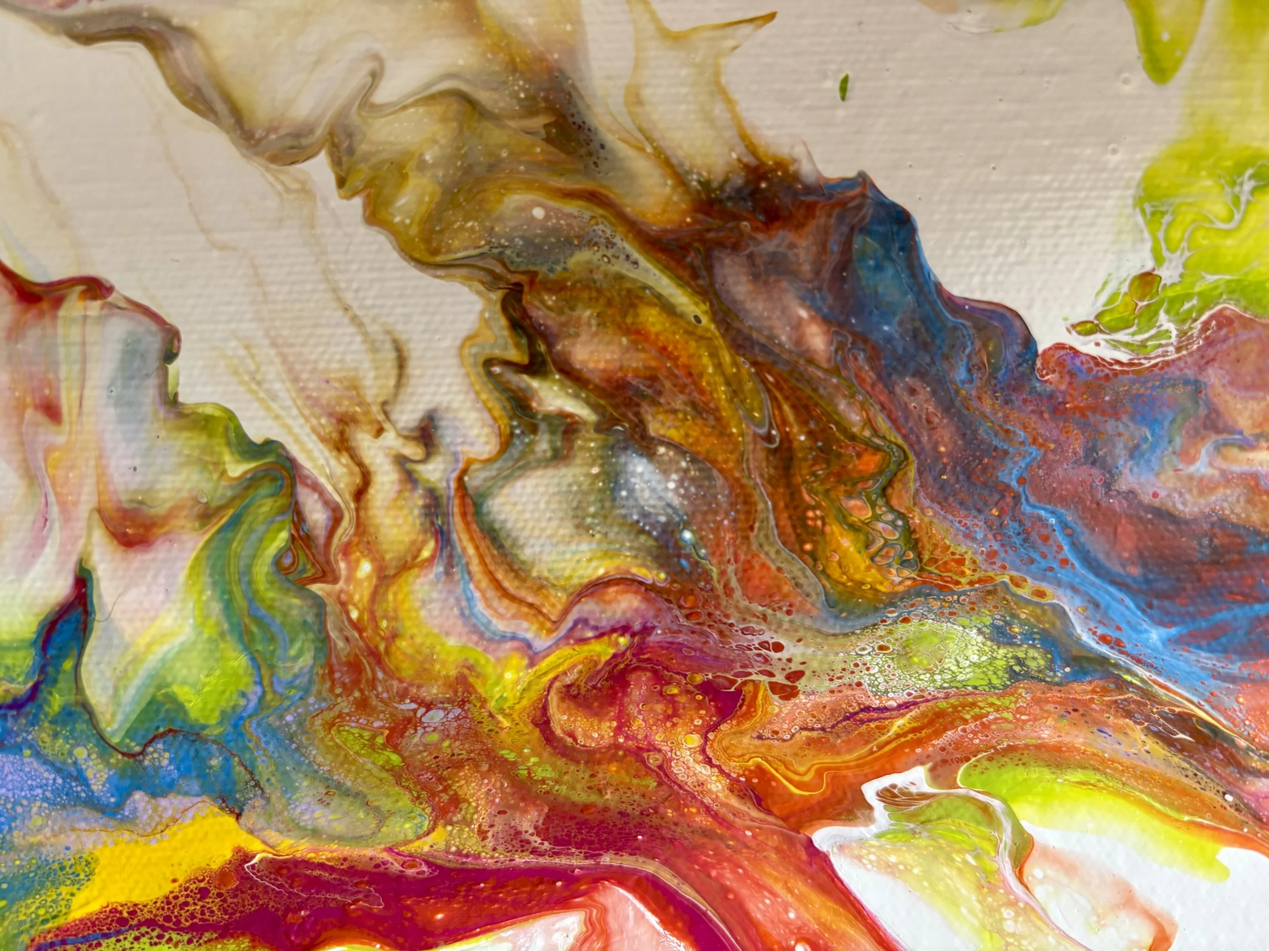 Swirling abstract painting with vibrant colors including red, yellow, green, blue, brown, and white blending together.