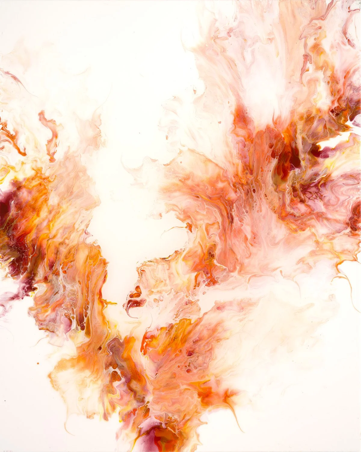 Abstract swirl of orange, pink, and yellow colors on a white background.