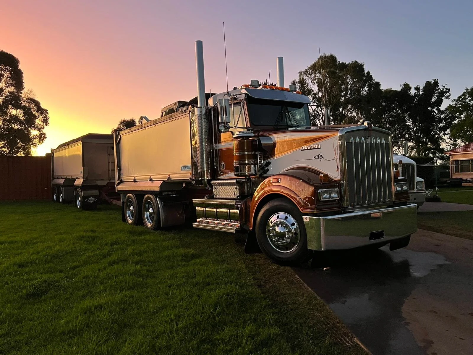 A large, vintage Kenworth semi-truck for haulage services by MC Civil