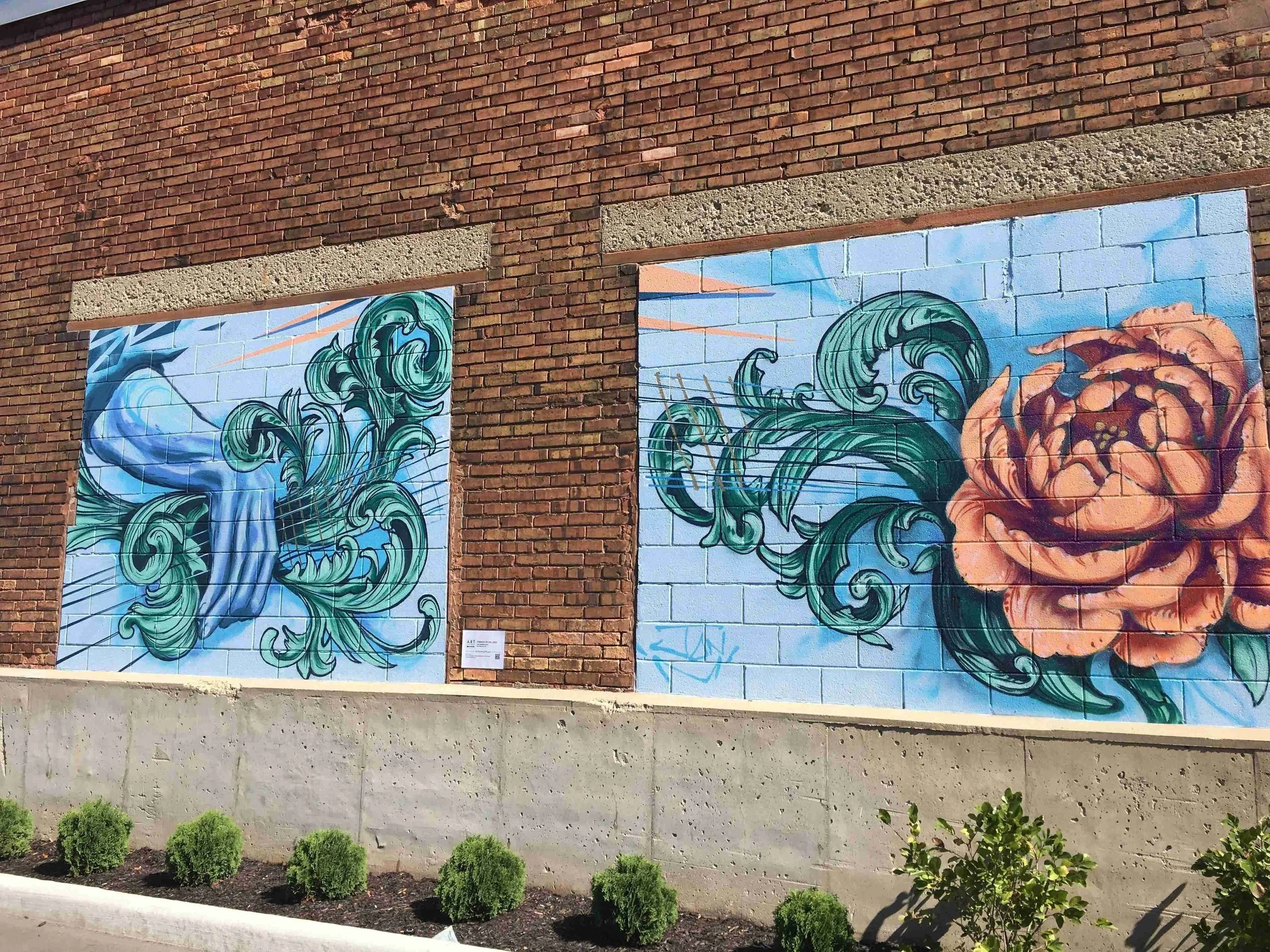 Classic Ornamentation on a diptych with reference to Picaso’s Guitar Player strumming guitar strings on one panel and a stylized boom on the other. The work references traditional decorative
motifs while reinterpreting them through a contemporary
mur