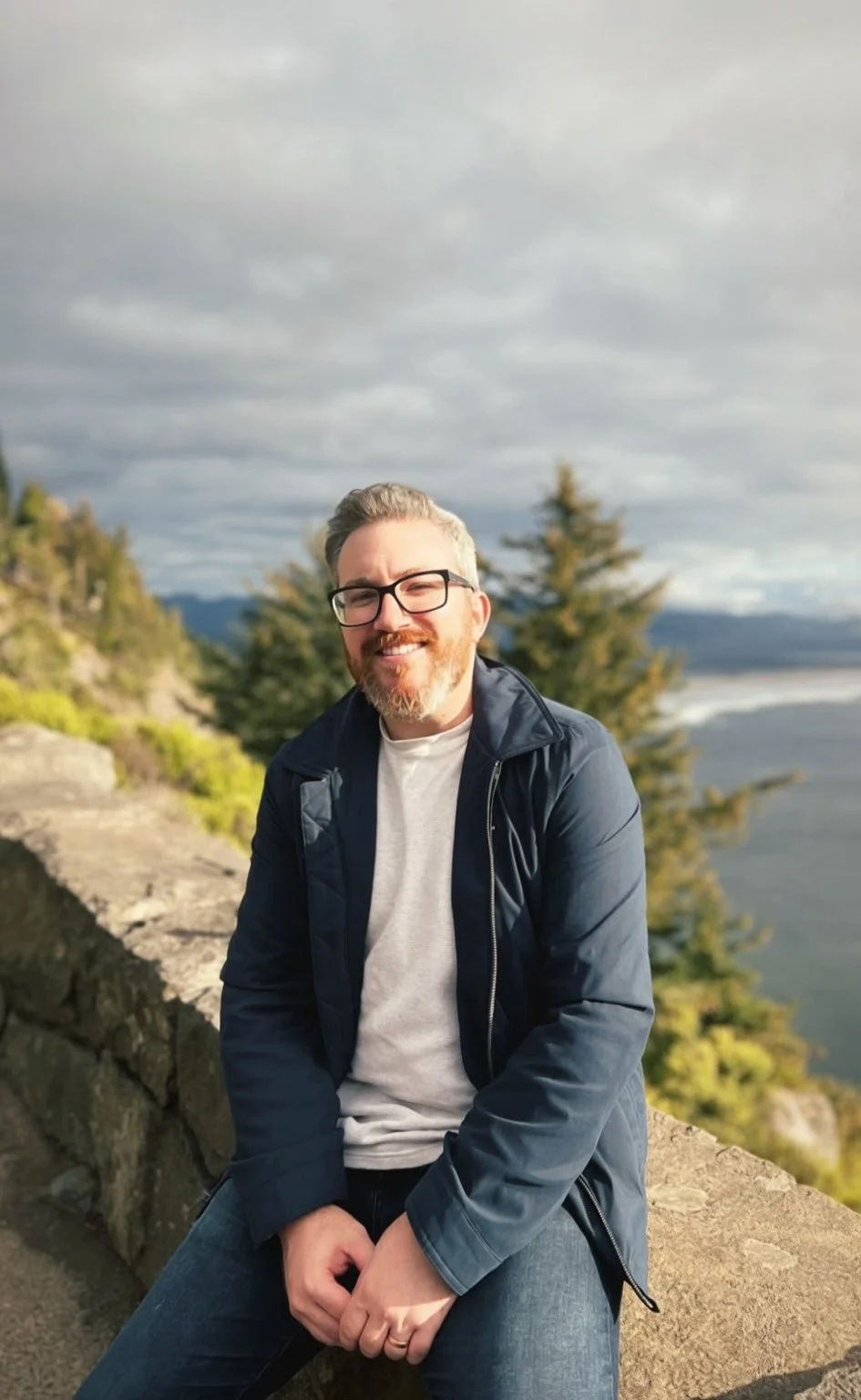 Andrew Richey, LCSW, smiling outdoors in Oregon