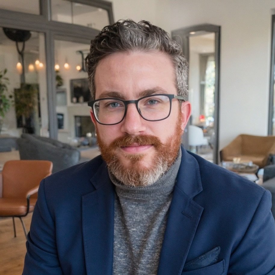 Andrew Richey, LCSW, wearing glasses at Enriched Counseling and Consulting