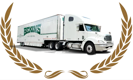 A white semi-truck with a trailer labeled 'Berkins' parked on a road under a blue sky, framed by a gold laurel wreath.