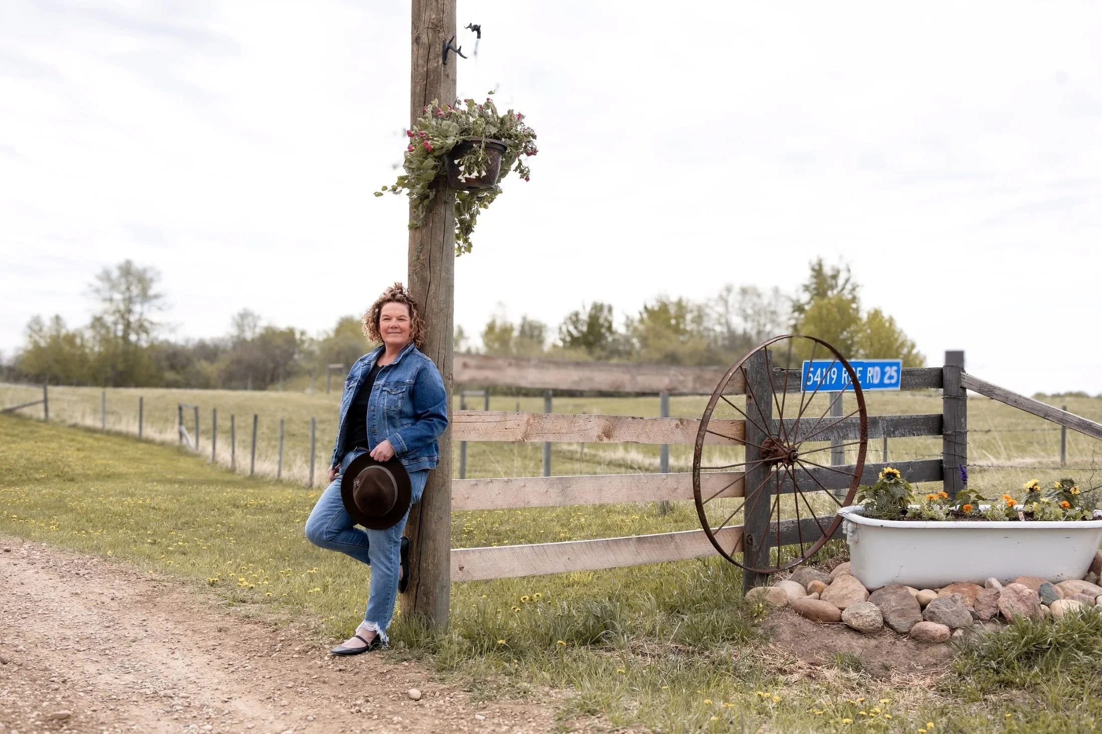 Janet Langevin standing on the property grounds of Hoofstone Acres near Alberta Beach.