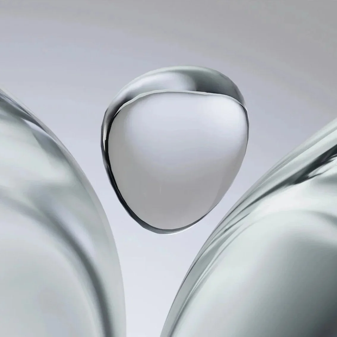 Close-up of metallic, rounded objects that appear to be cans or similar containers with a reflective surface.