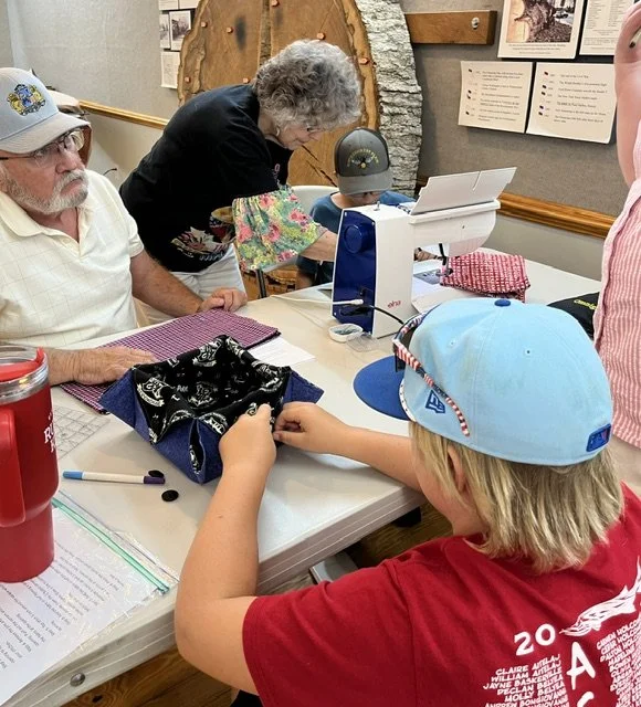 Tavern Quilters teach kids.jpeg