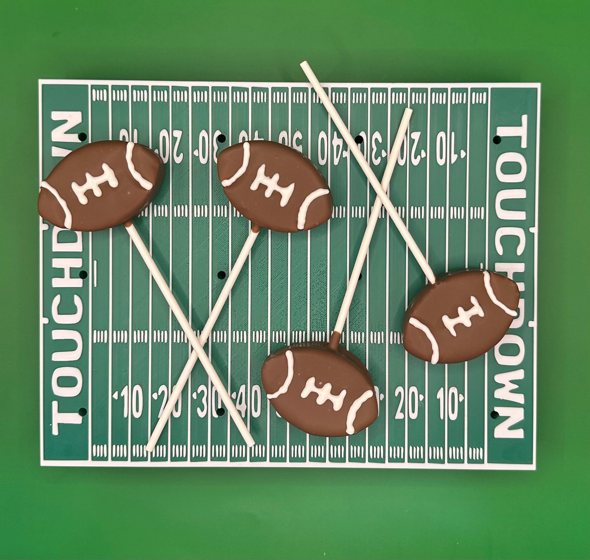 Football cake pops.jpg