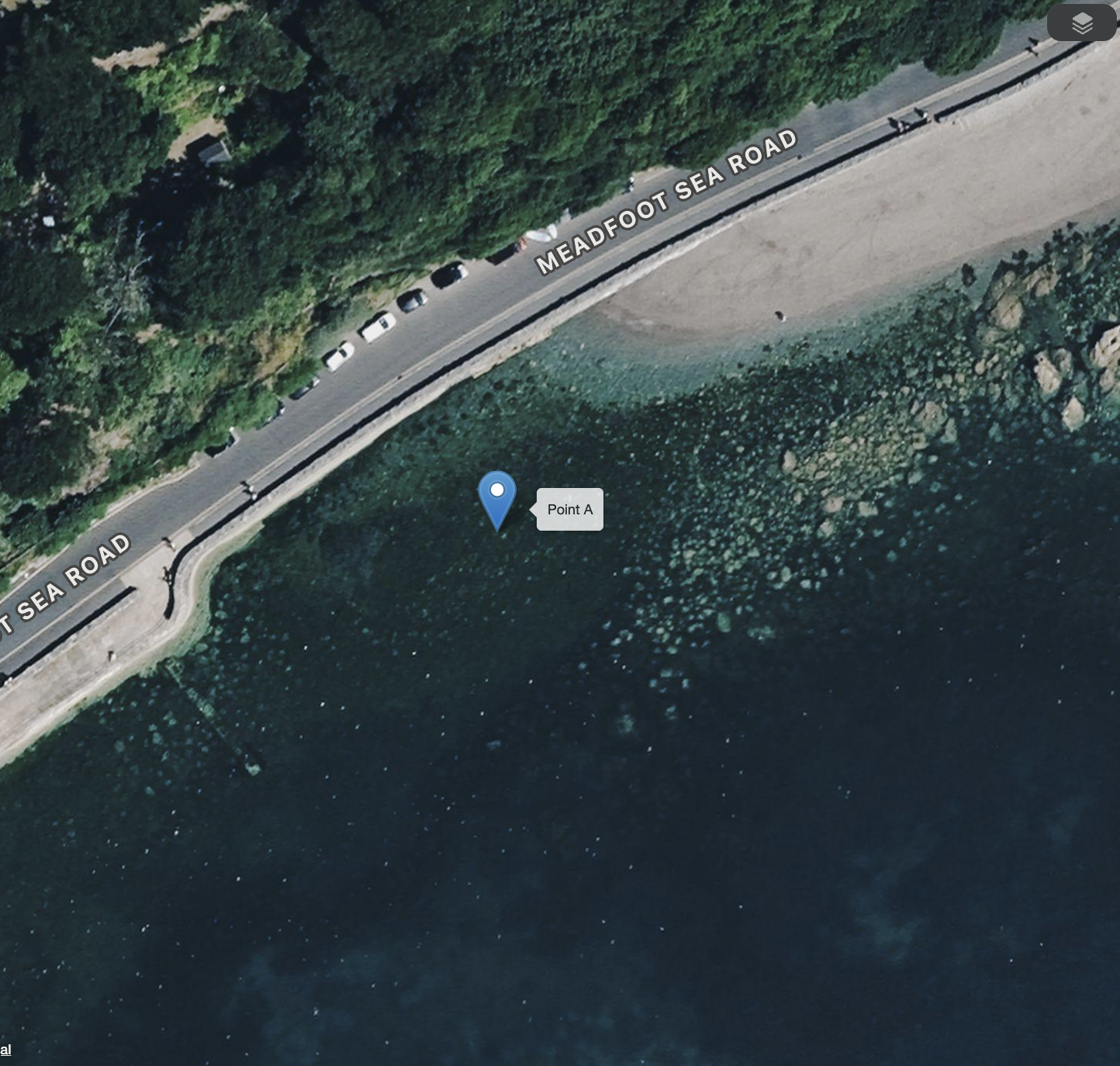 An aerial view of a coastal road called Meadowood Sea Road running near the shoreline with parked cars on the side, trees along the top, and clear waters with rocks and seaweed along the bottom. A point marker labeled 'Point A' is near the water.