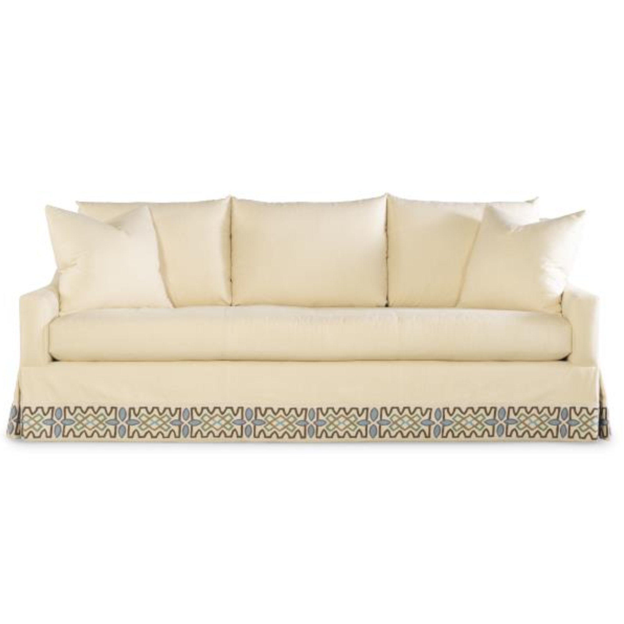 A cream-colored sofa customized Schumacher trim with cushions provided COM from Hickory White.