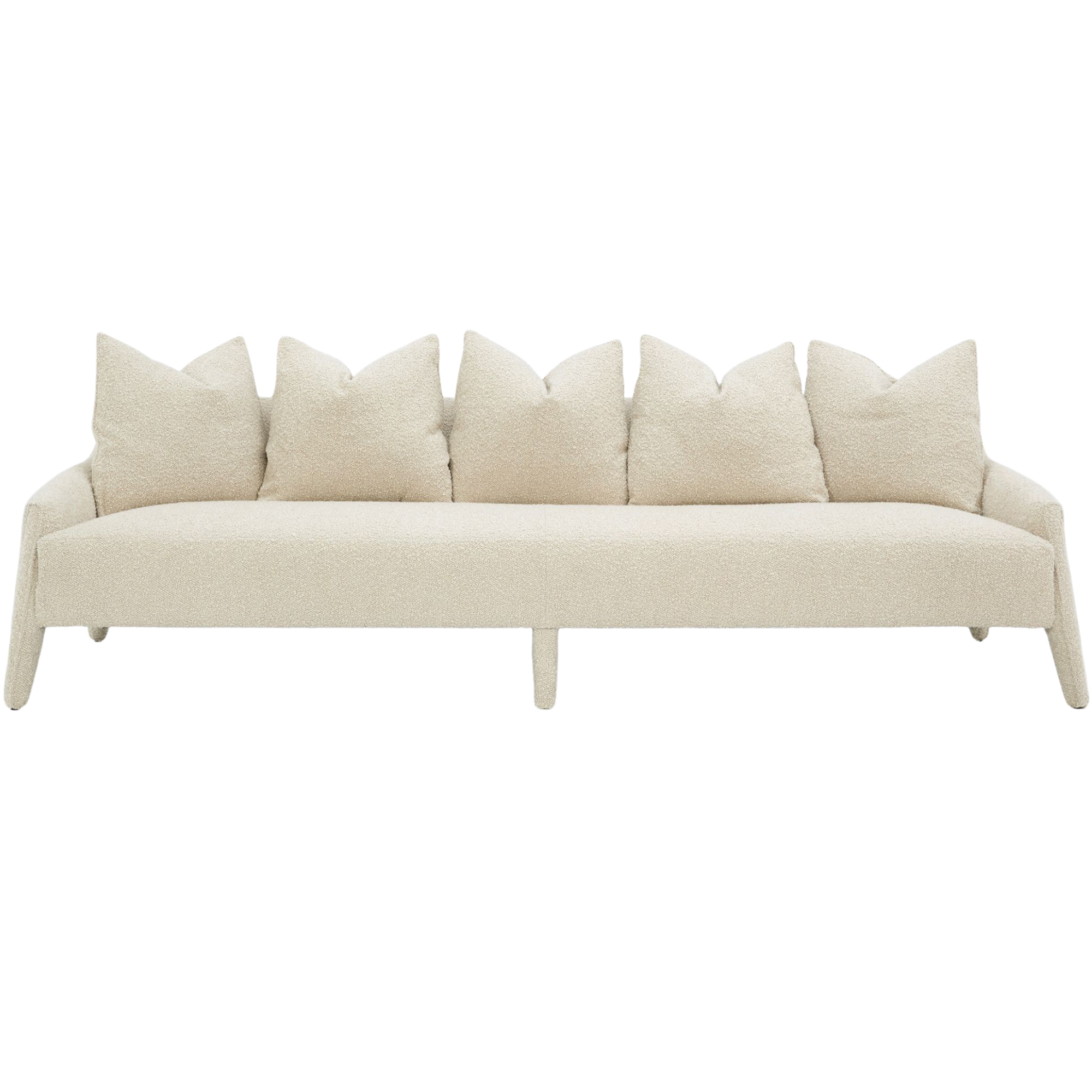 Beige sofa with tufted backrest and armrests, decorated with decorative cushions by verellen.
