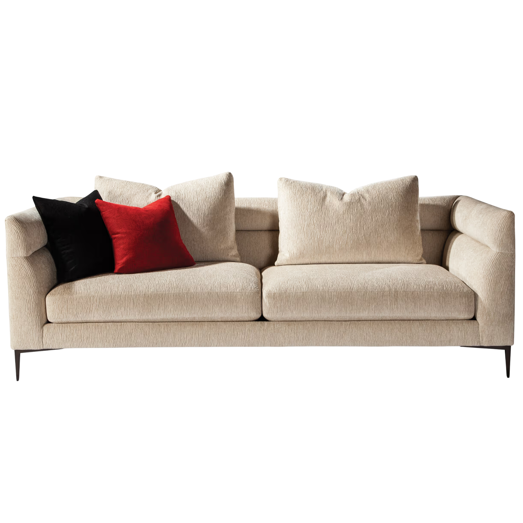 A beige sofa with black, red, and beige pillows with customers own material COM.