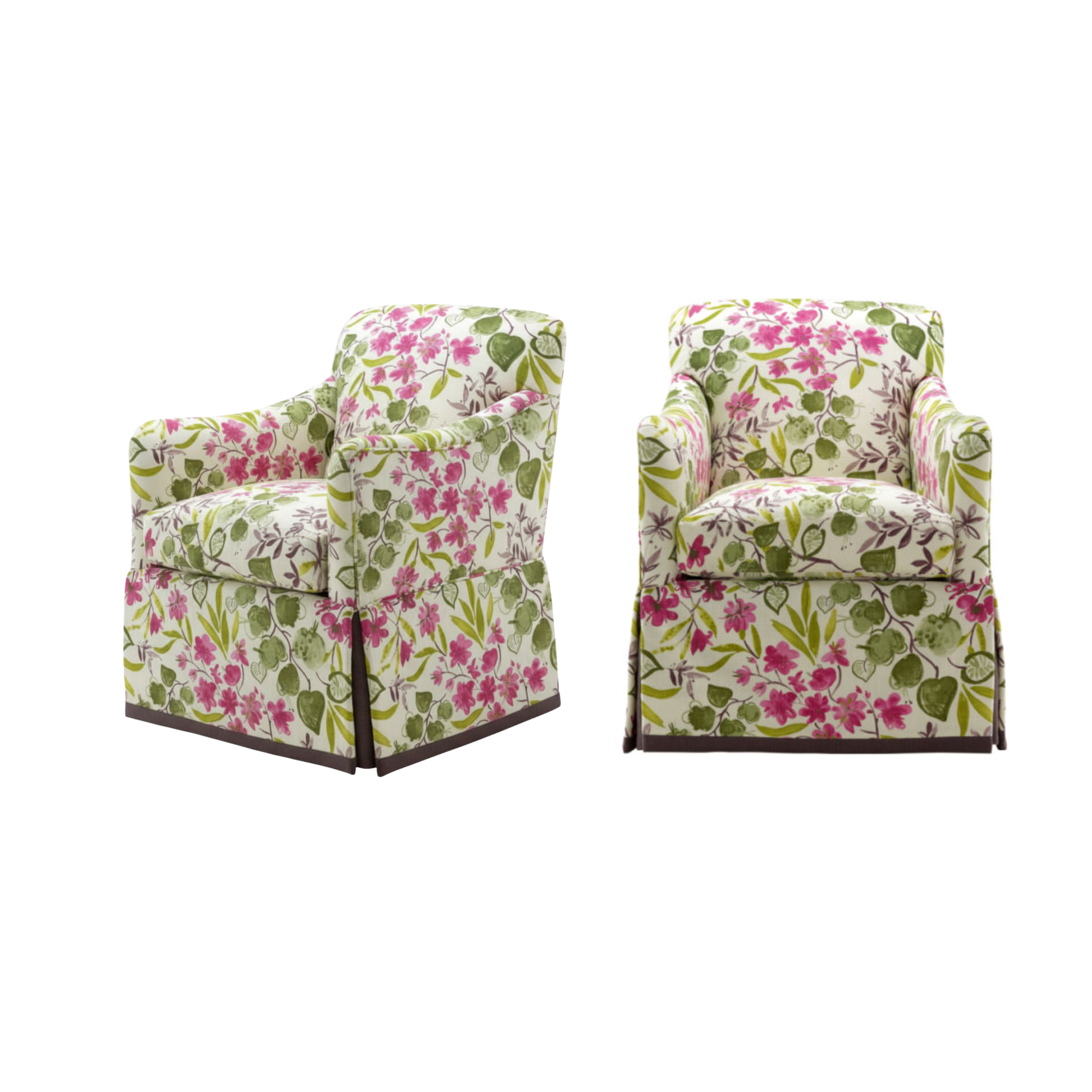 Two upholstered armchairs with floral patterns in pink and green in COM fabric sourced from lee industries.