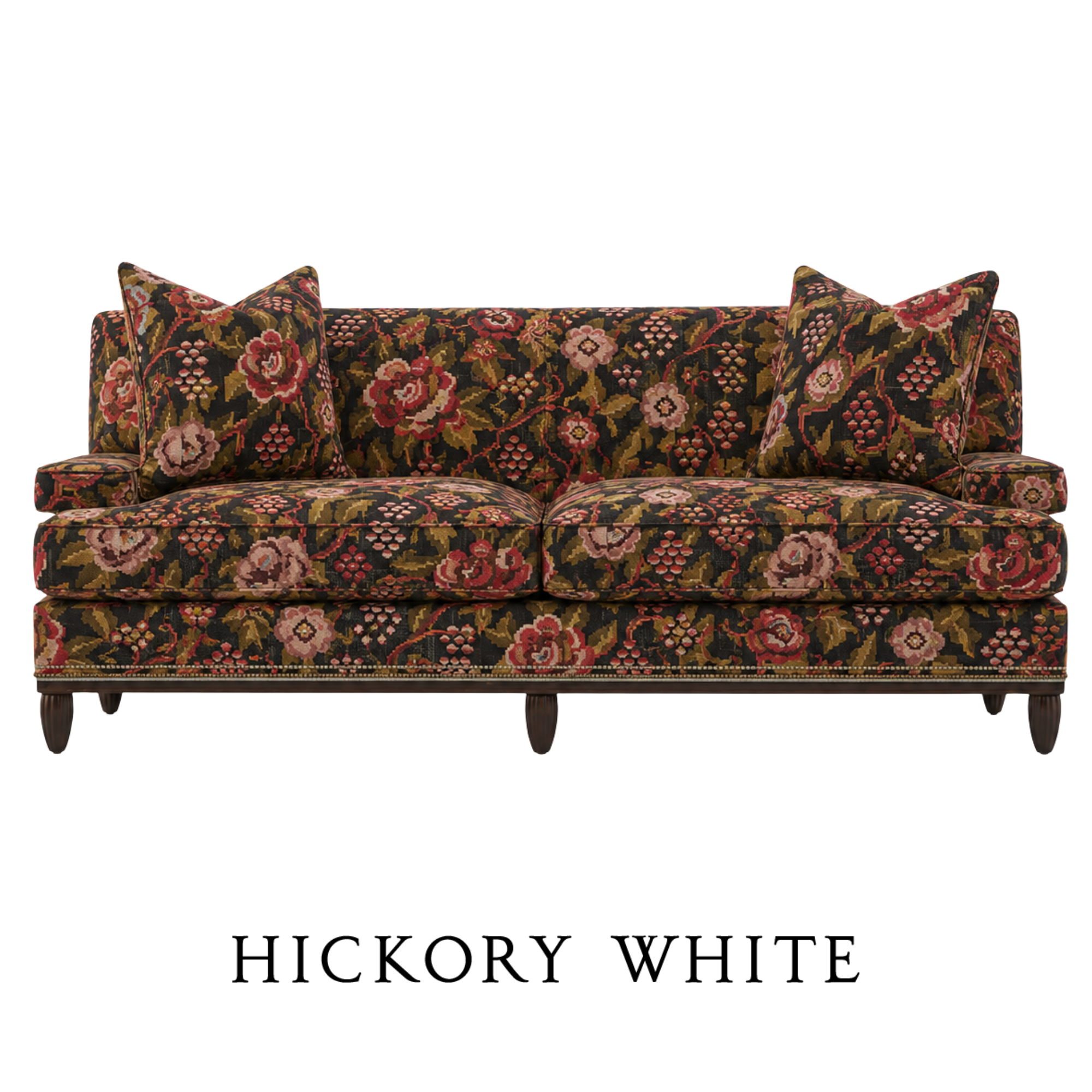 A floral-patterned vintage style sofa custom upholstered from Hickory White in JAB textiles.