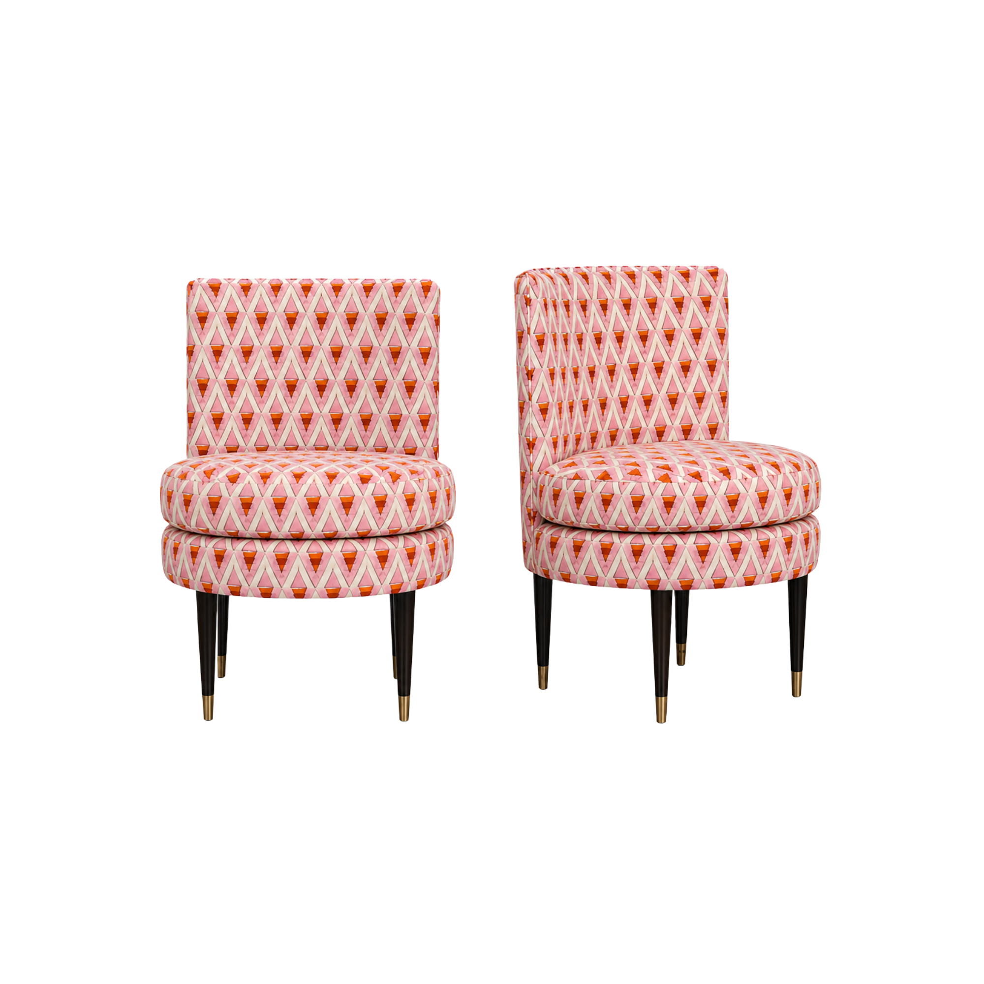 Two Dedar upholstered chairs with pink geometric patterns and black wooden legs, sourced from Highland House.