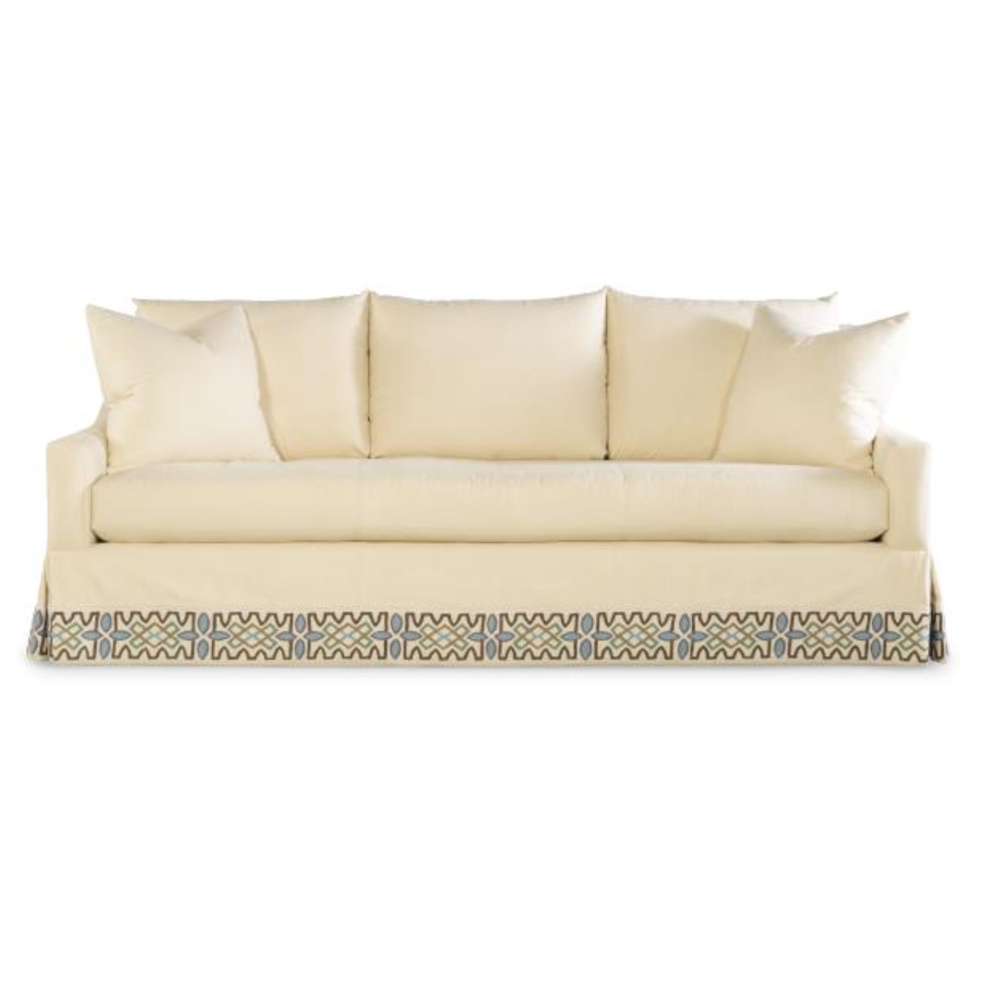 A cream-colored sofa with multiple cushions custom made by Highland House.