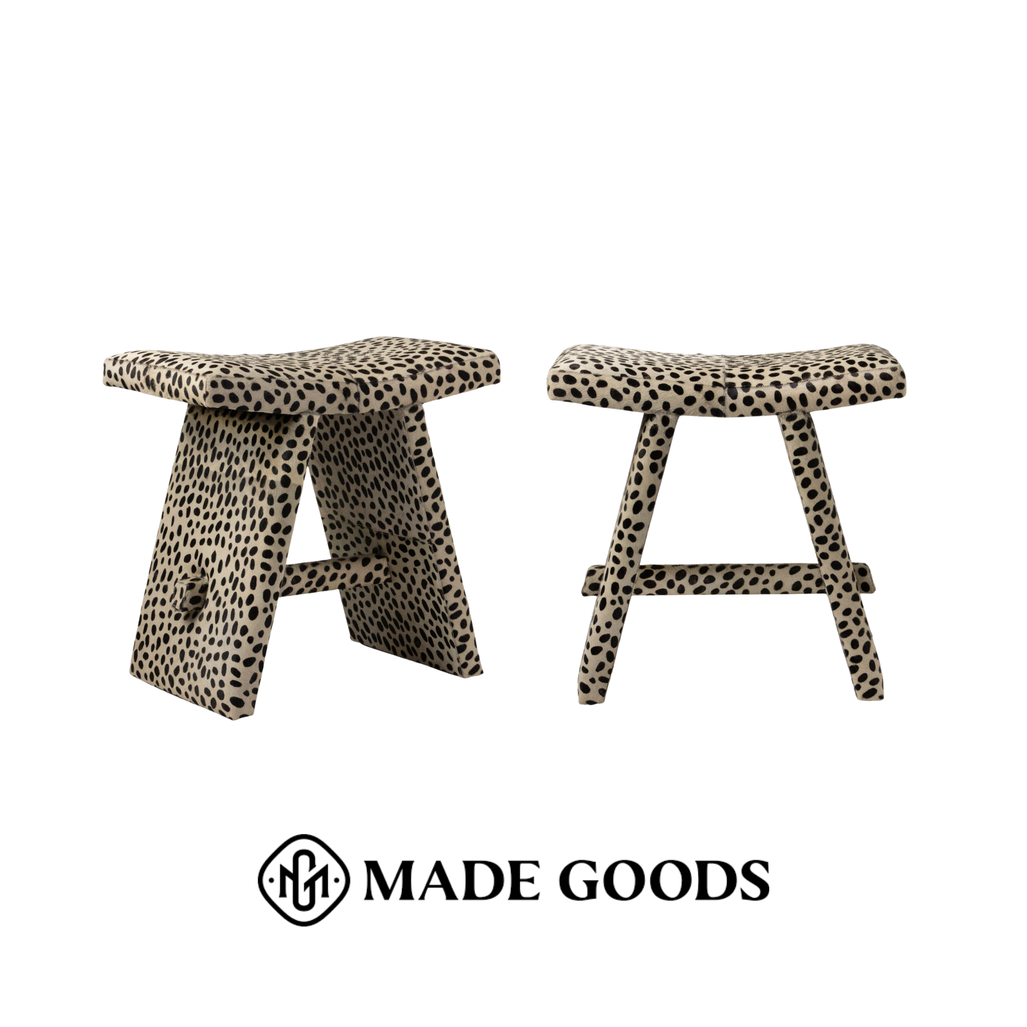 Two upholstered custom fabric leopard print stools from Made Goods.