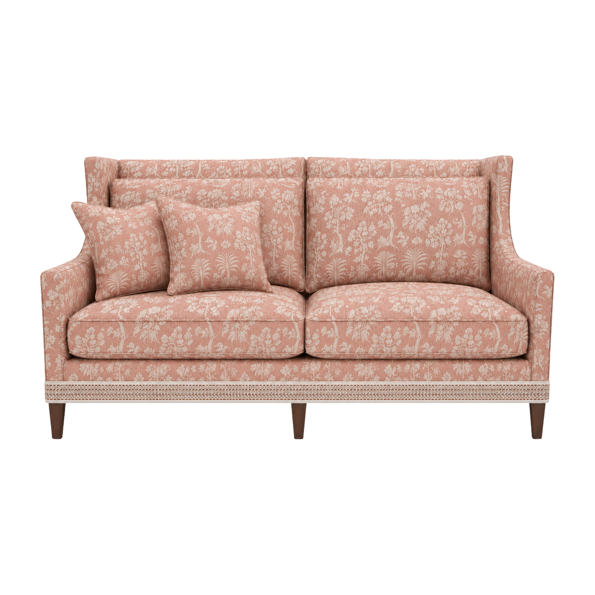A pink LEE Industries custom upholstered sofa with a floral pattern and matching pillows, using James Malone textiles fabric.