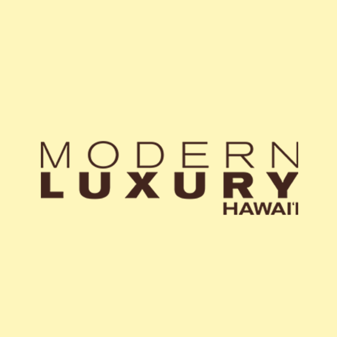 Close-up of beige background featuring black text that reads 'MODERN LUXURY HAWAII'.