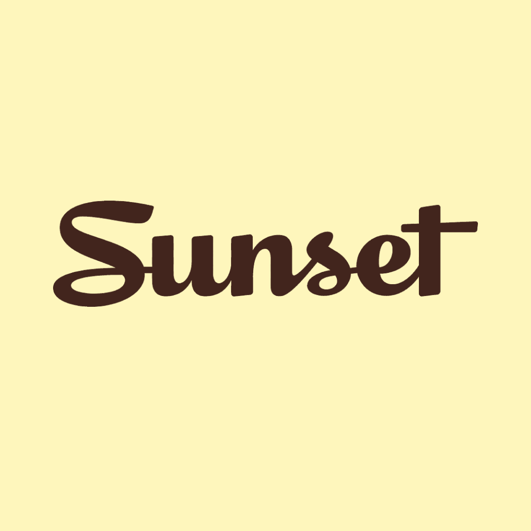Close-up of beige background featuring black text that reads 'SUNSET'