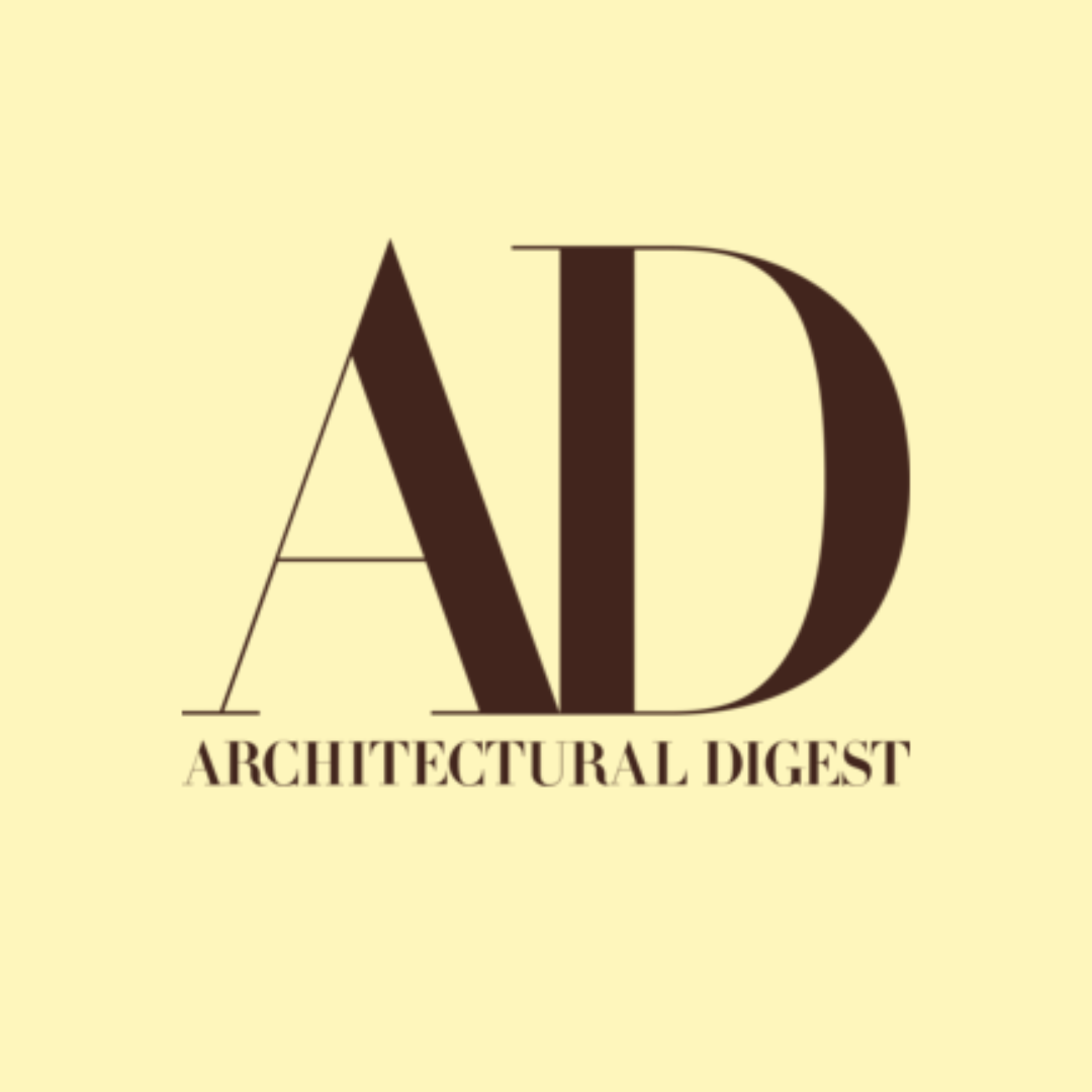 A close-up of publication cover titled 'Architectural Digest' with black text on a light yellow background.
