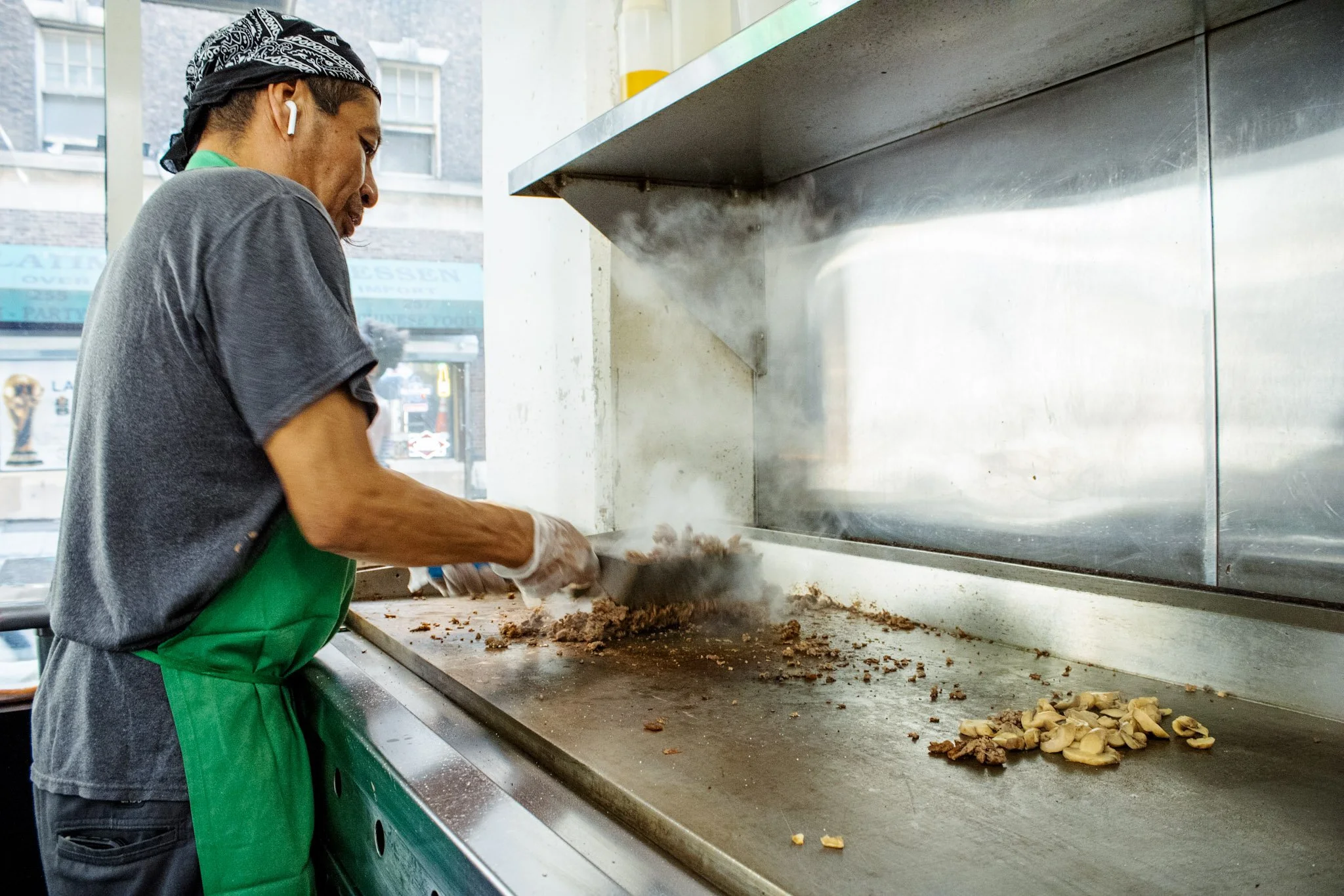 Philadelphia pizza cheesesteaks wings fries lunch dinner near me cooking in the kitchen