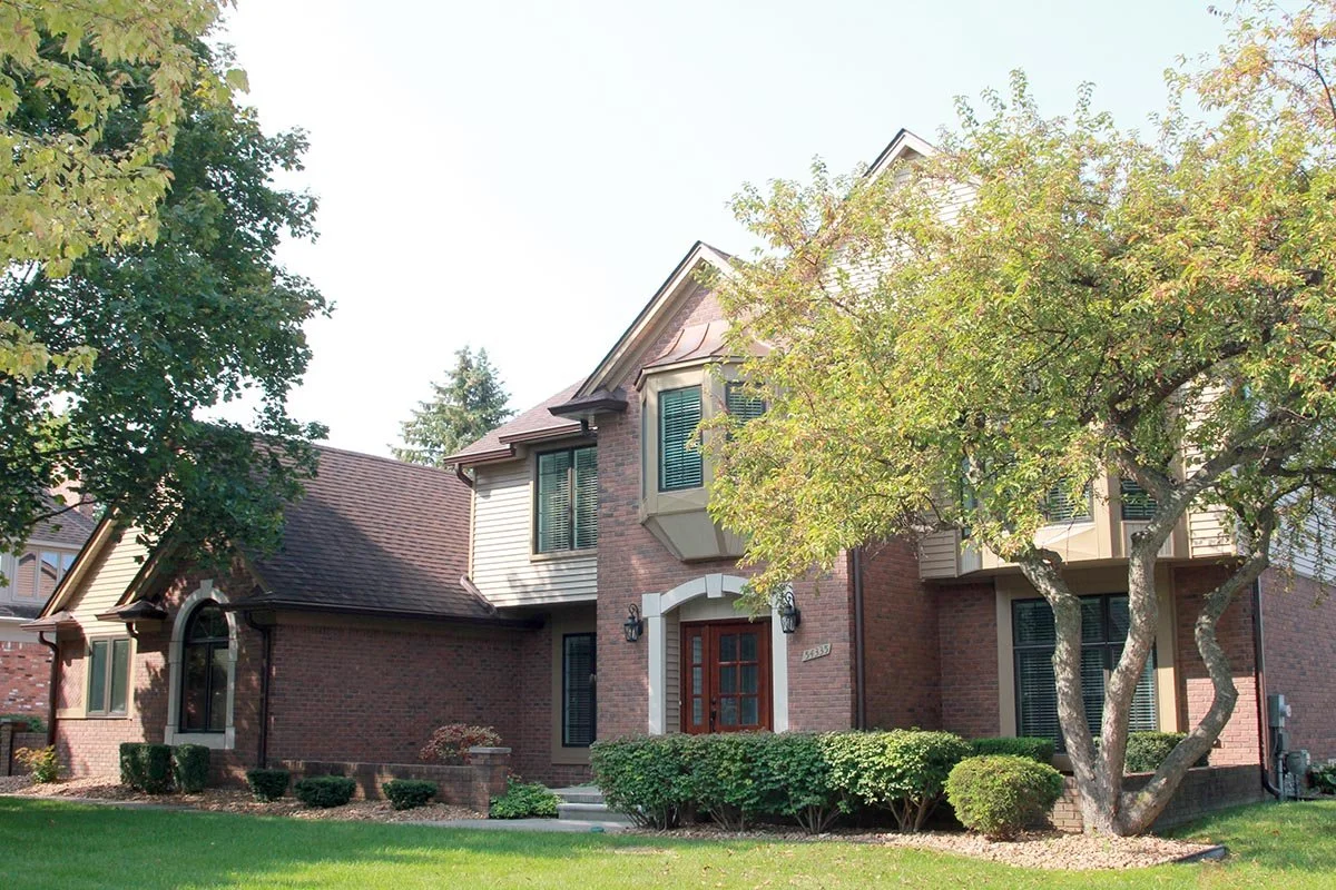 Lipski front elevation. Included installing new Pella windows, premium vinyl siding and custom aluminum trim.