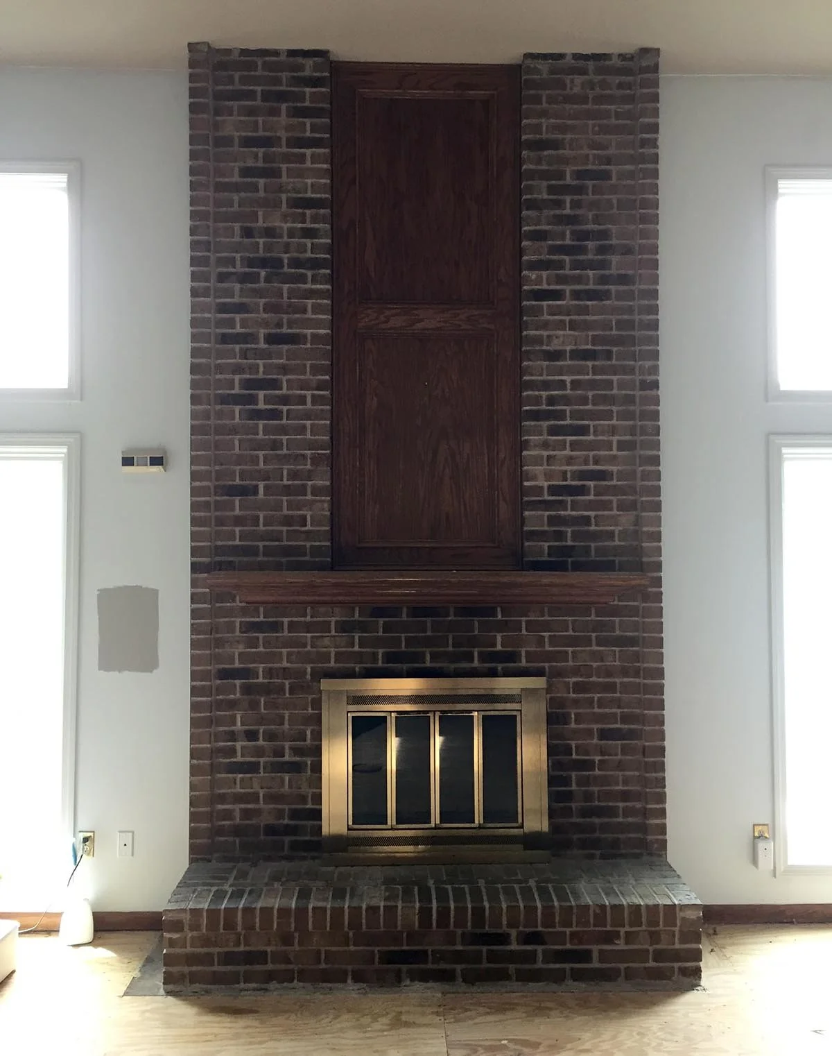 Complete interior renovation of 3100 sq ft home. Fireplace before...