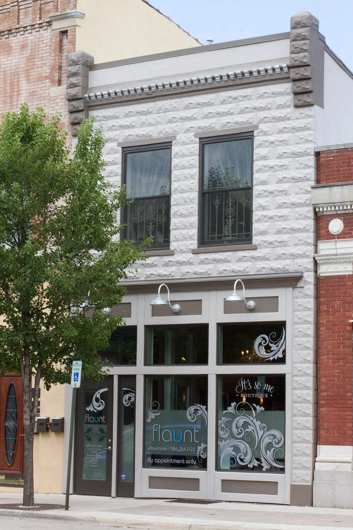 Complete interior and exterior renovation of  historical building (1906).  Exterior scope of work included: reframing the front and rear elevations, installing Pella doors and windows, new paint, new Dryvit, new lighting.  Flaunt Salon, Utica, MI.