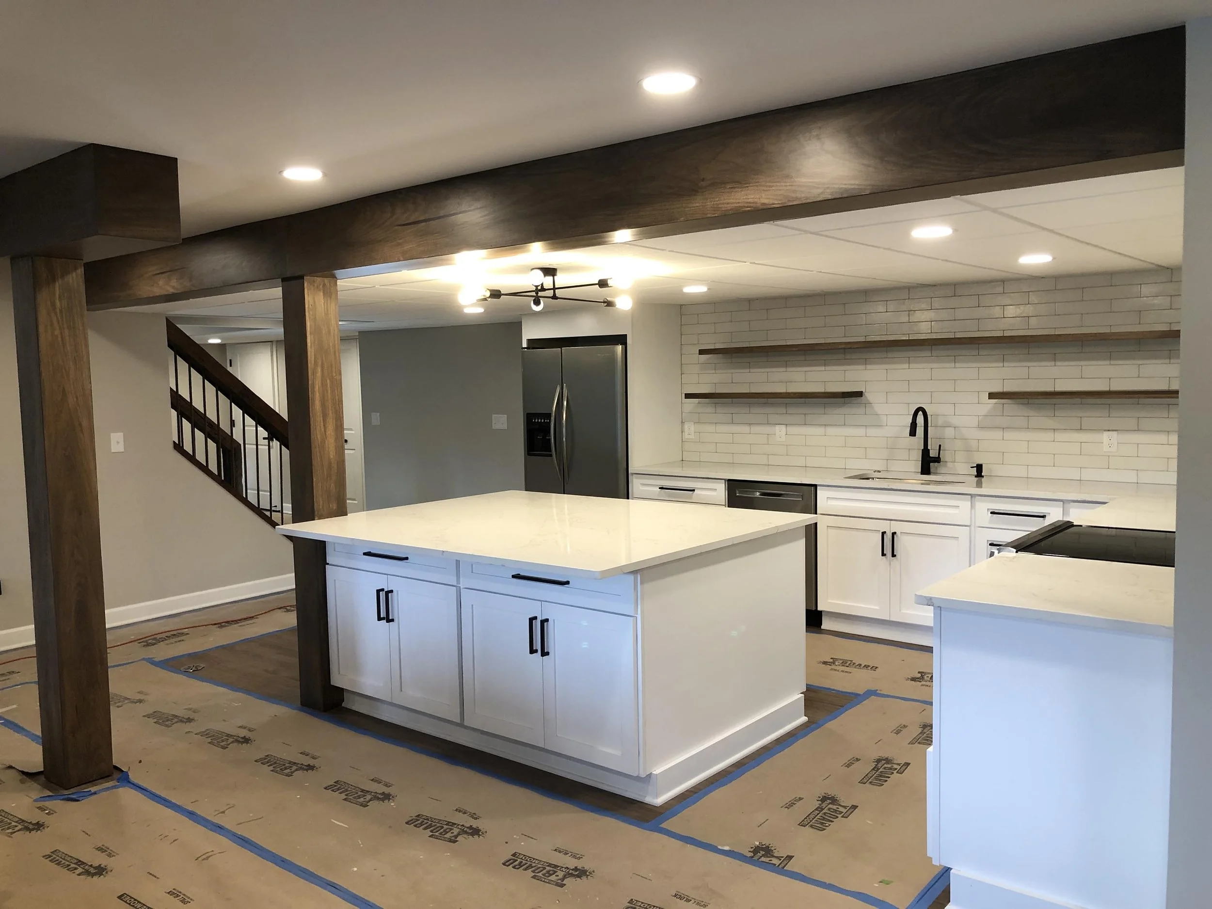 Michelle Lane, Shelby Township. Basement renovation with kitchen and bathroom.