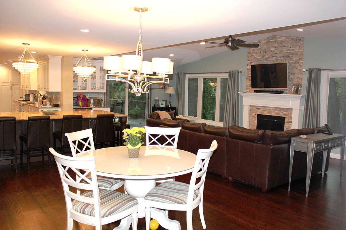 Shady Hollow interior work included: new addition with vaulted ceiling, dry stacked stone fireplace with custom built fireplace surround, hardwood floors throughout, renovated kitchen and bathrooms with LaFata cabinets and granite tops, new doors and