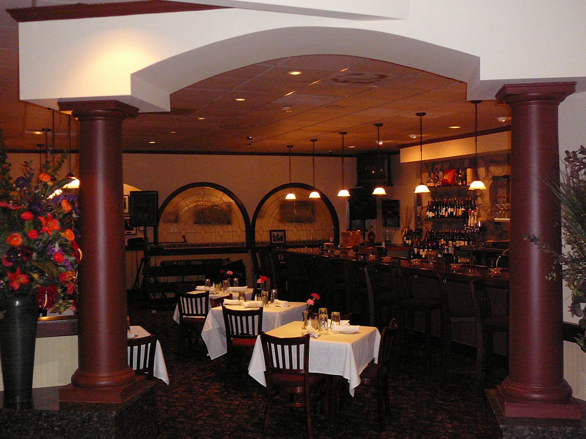 Austin’s interior elevation. Work completed included: framing custom archways and column throughout, custom stonework throughout, custom lead glass windows throughout, etc.