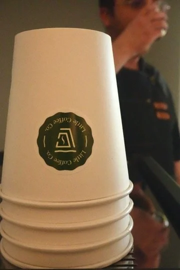Little Coffee Co branded paper cups for coffee cart catering in Madison, WI and surrounding areas