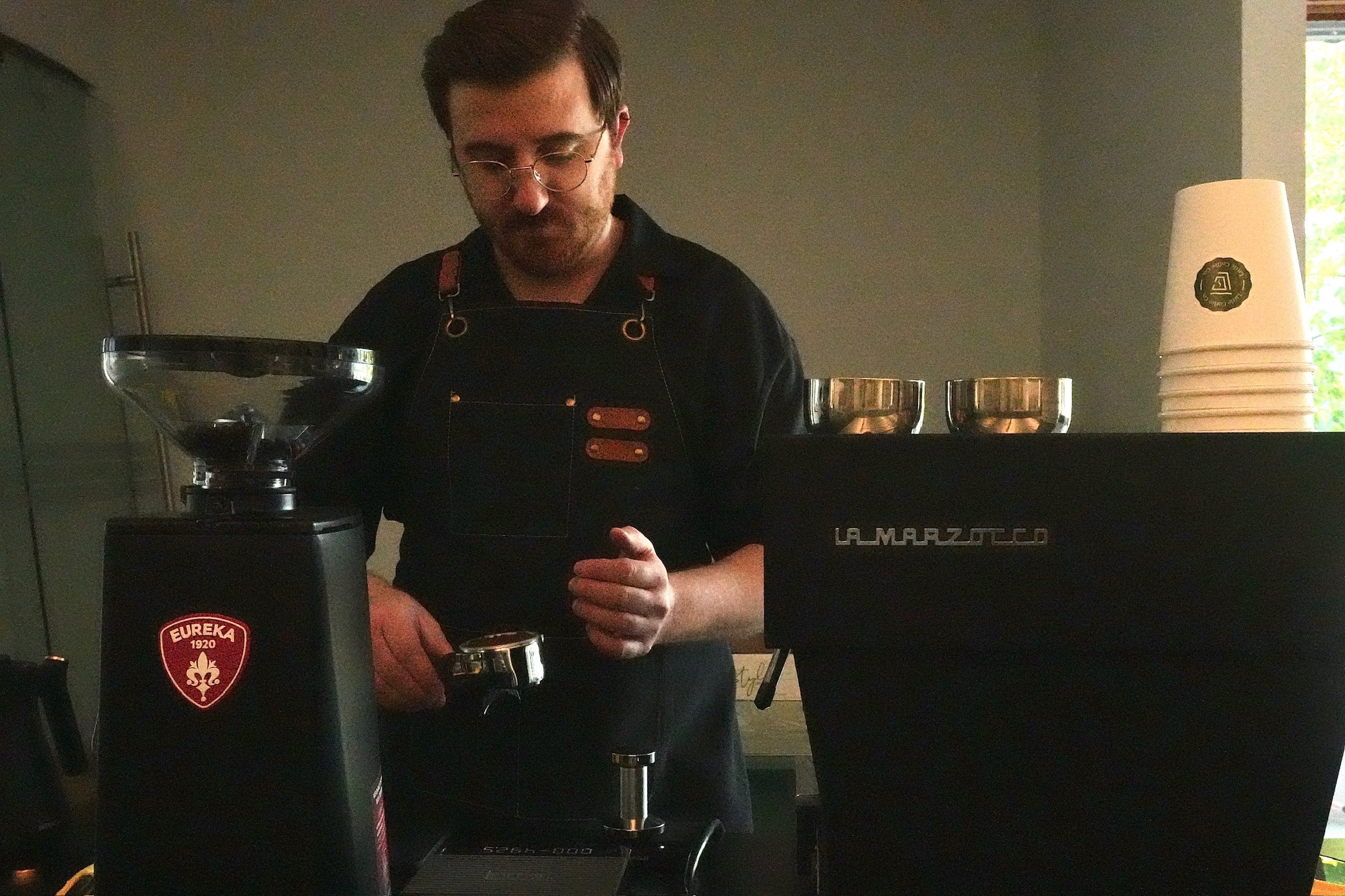 Little Coffee Co barista preparing espresso drinks for coffee cart catering in Madison, WI and surrounding areas