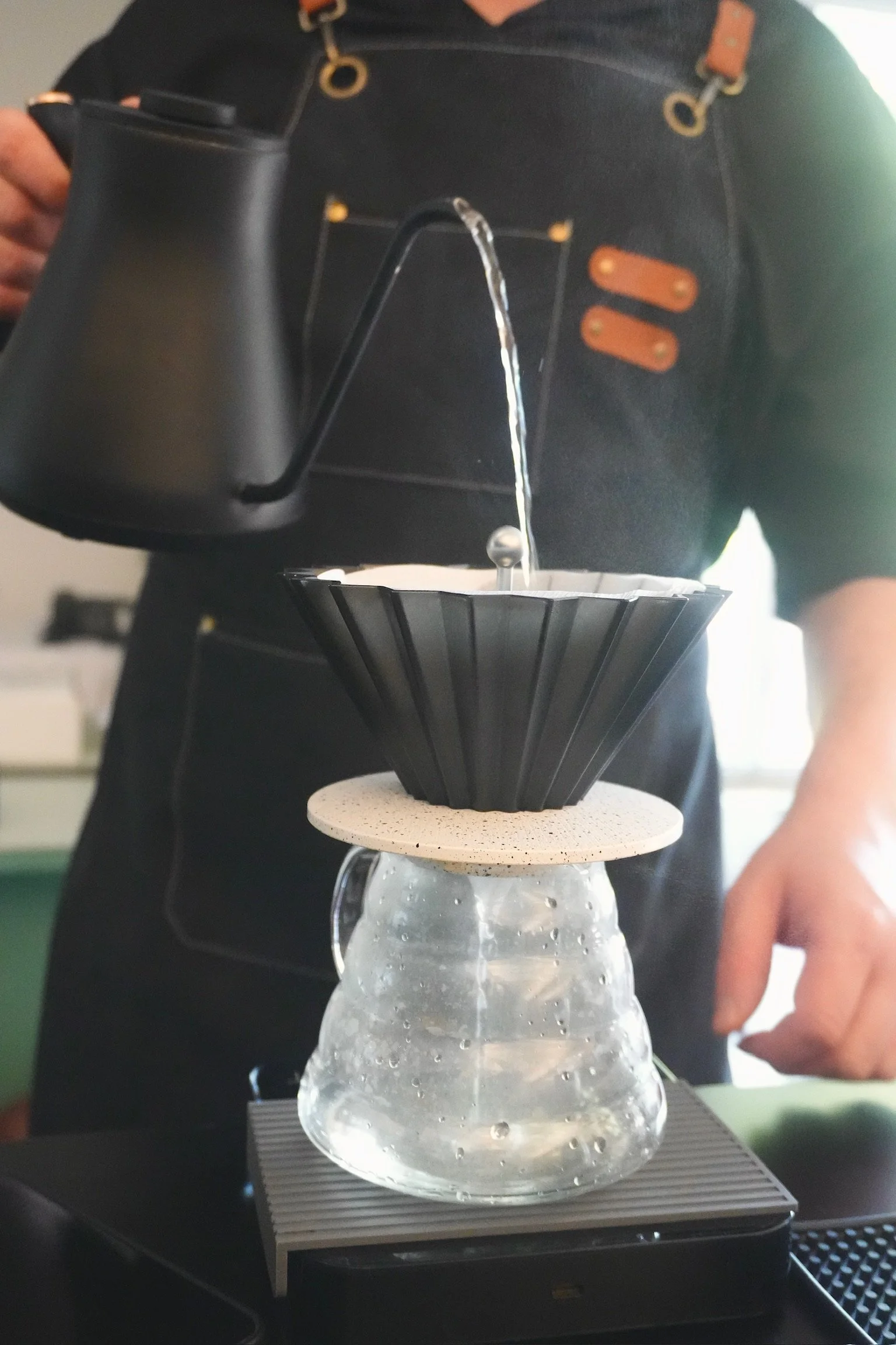Barista preparing pour-over coffee for Little Coffee Co coffee catering in Madison, WI and surrounding areas