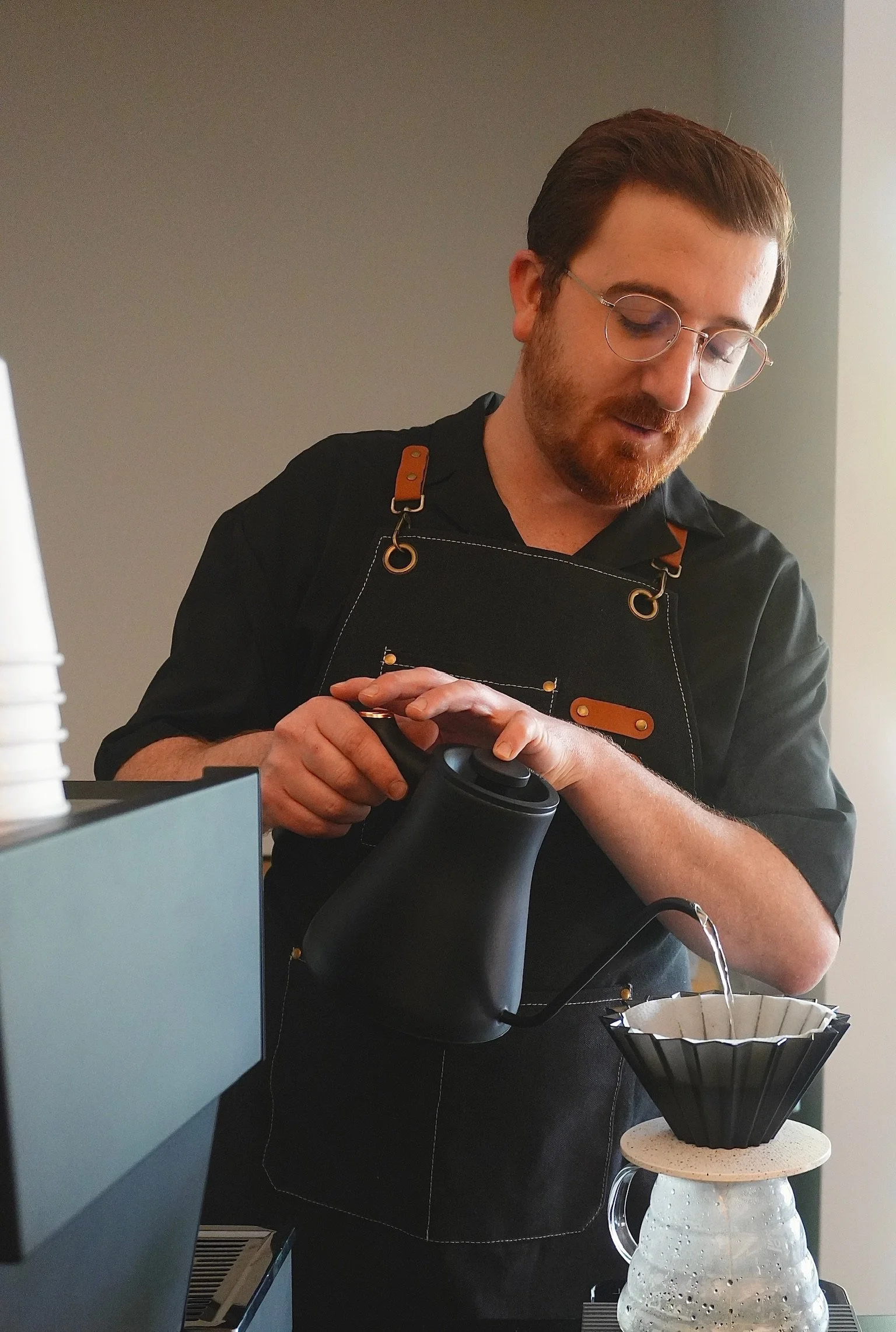 Little Coffee Co barista preparing pour-over coffee for coffee catering events in Madison, WI and surrounding areas