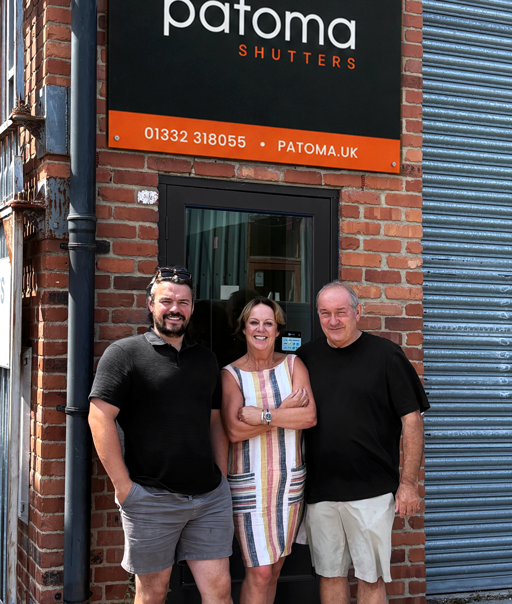 Patoma Shutters family team outside the Patoma premises in Derby, representing the family-run window shutter business and its experienced local team.