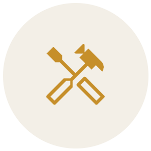 Icon of a hammer and screwdriver crossed over each other.