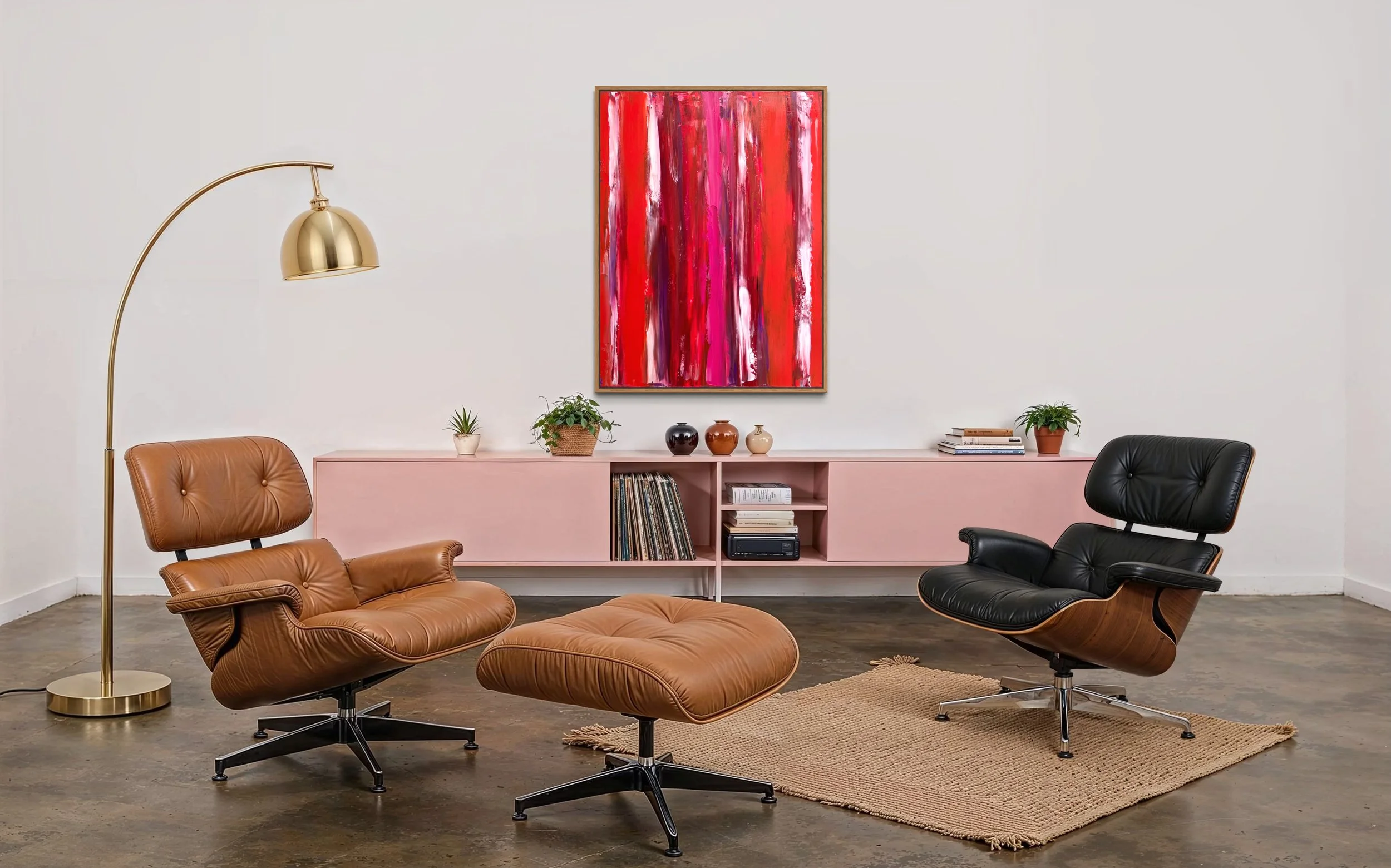 Living room with brown leather armchair and ottoman, a black lounge chair, a pink bookshelf with plants and decorative vases, a large colourful abstract painting WARM LOVE by Paul Bell on the wall, a brass floor lamp, and a beige rug.