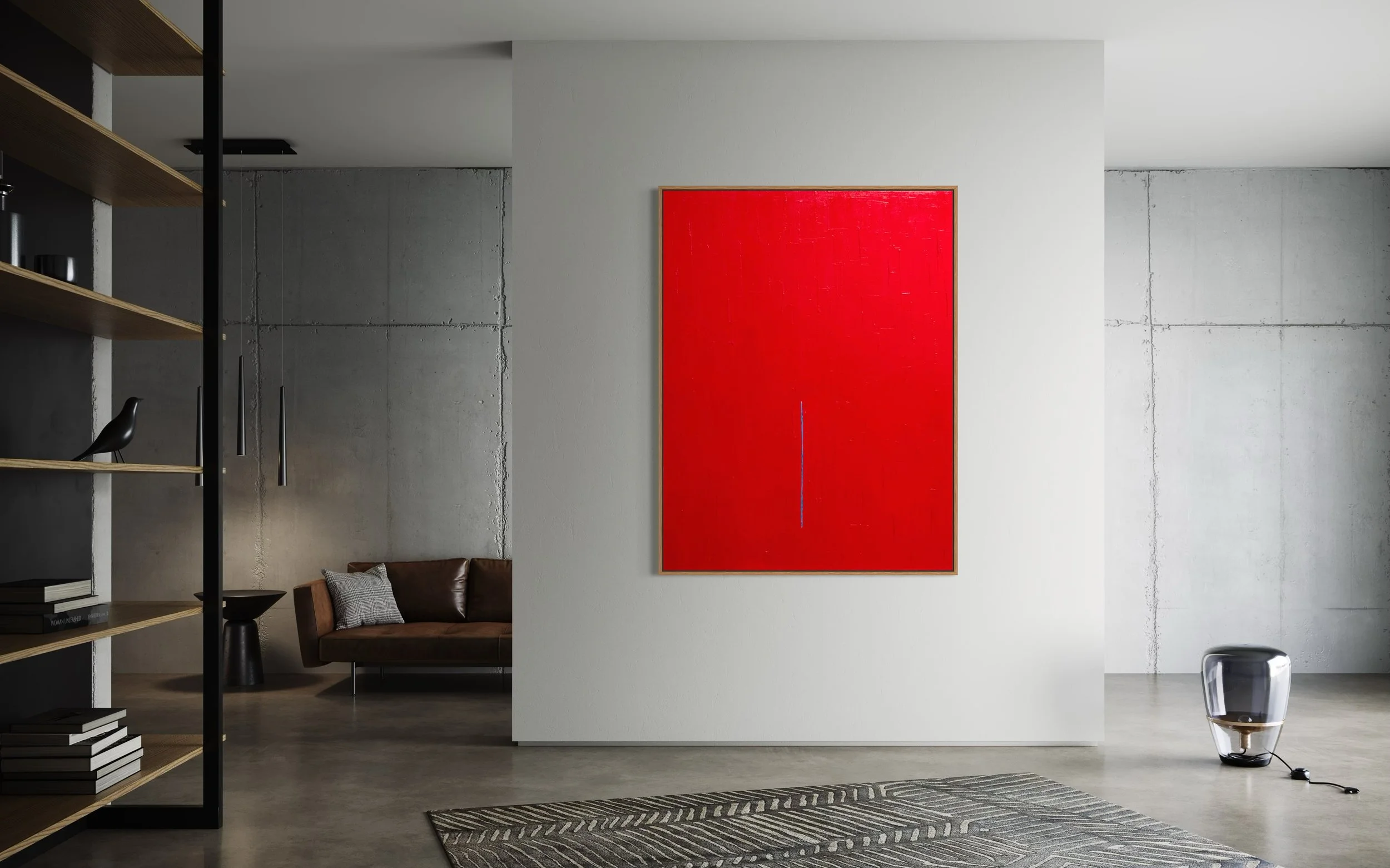 Modern living room with a red abstract painting, ONE by Paul Bell, on a white wall, a brown leather sofa with grey pillows, a black side table, a patterned rug, a black glass vase, a wooden bookshelf, and a clear glass speaker on the floor.