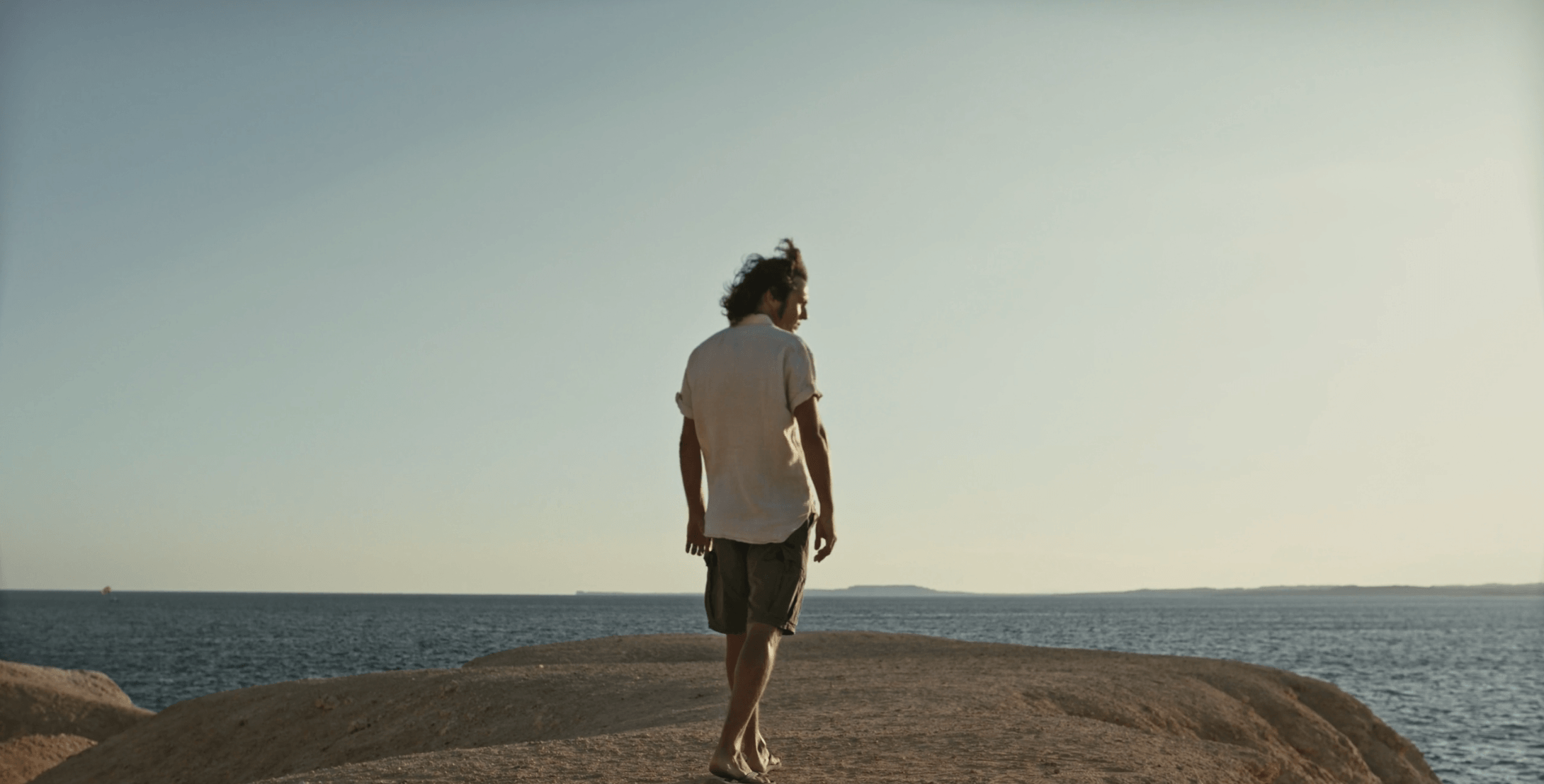 man on cliff.png