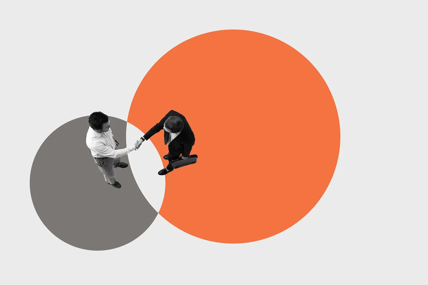 Two men shaking hands over a Venn diagram with intersecting gray and orange circles on a light gray background.
