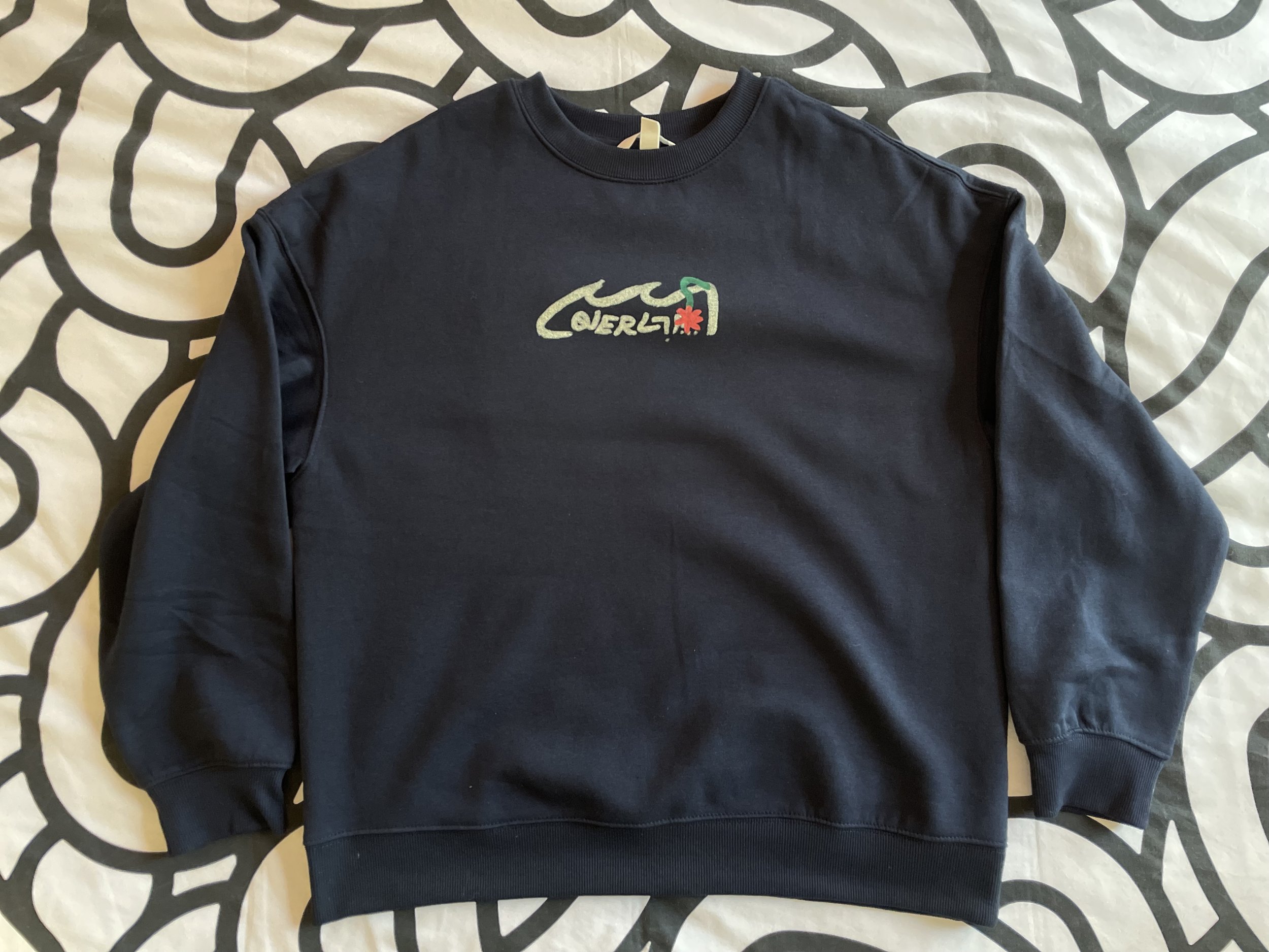 "Flores" blue crewneck  —feb. 2026 [front]