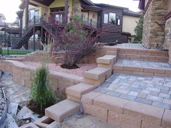 Buffalo Run retaining wall system with multiple tiers walkways and steps